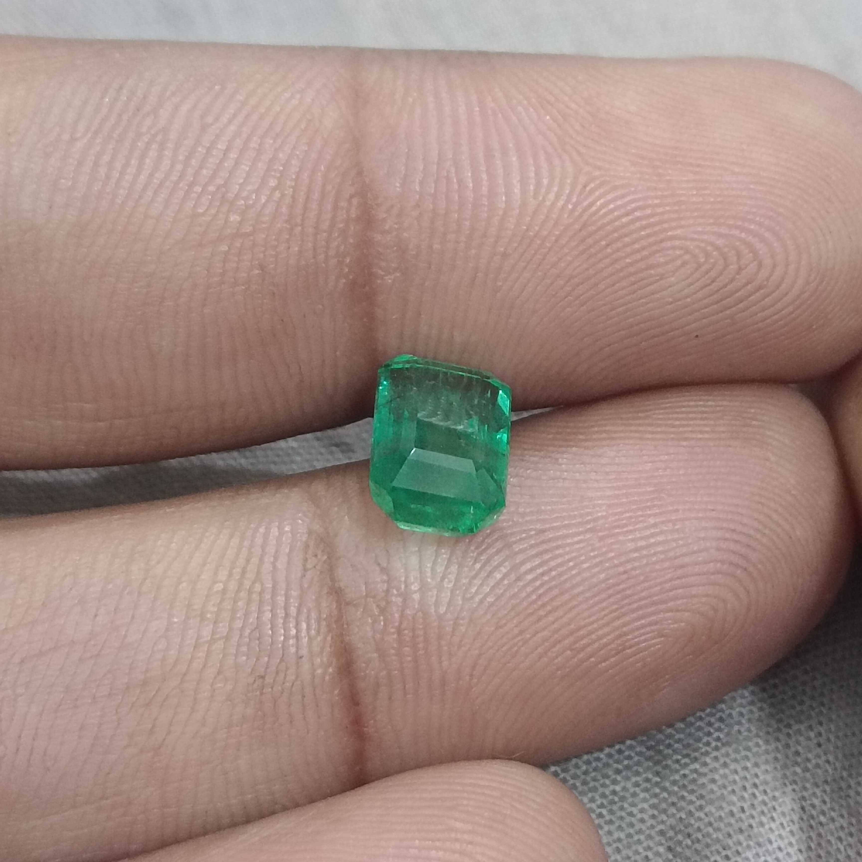 2.74ct certified intense medium green octagon cut emerald gemstone 