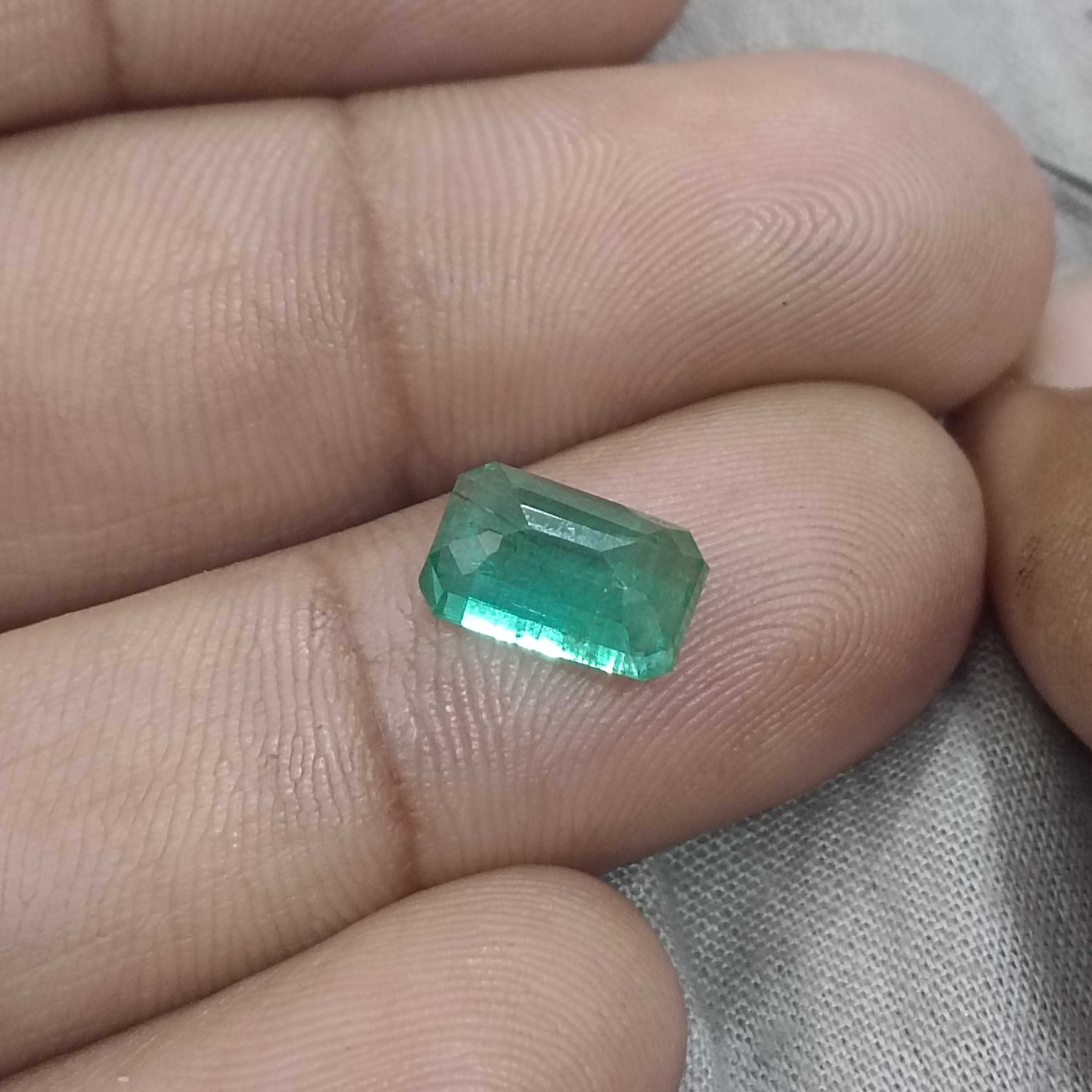 2.74ct certified intense medium green octagon cut emerald gemstone 