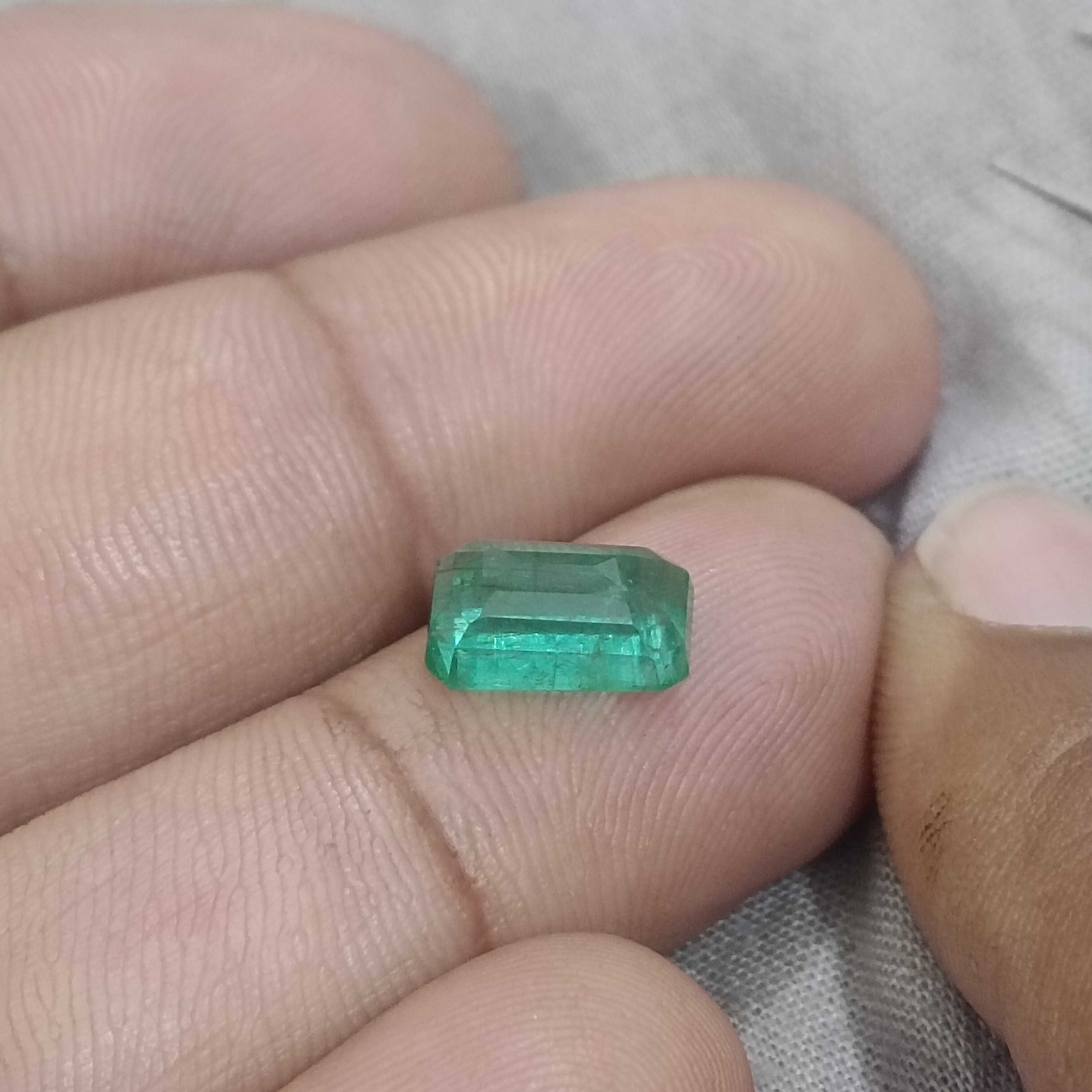 2.74ct certified intense medium green octagon cut emerald gemstone 