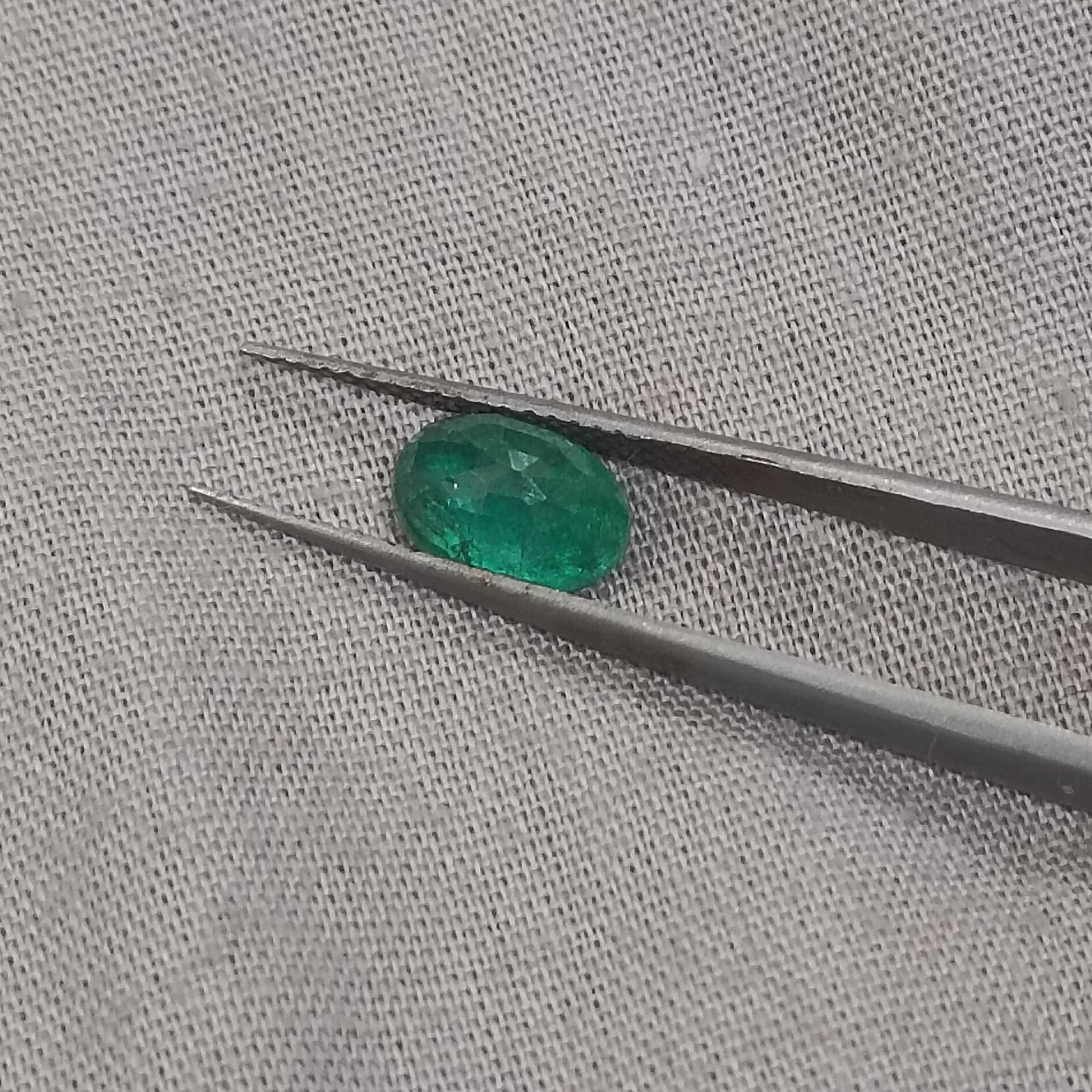 1.54ct GSI certified vivid green oval cut emerald 