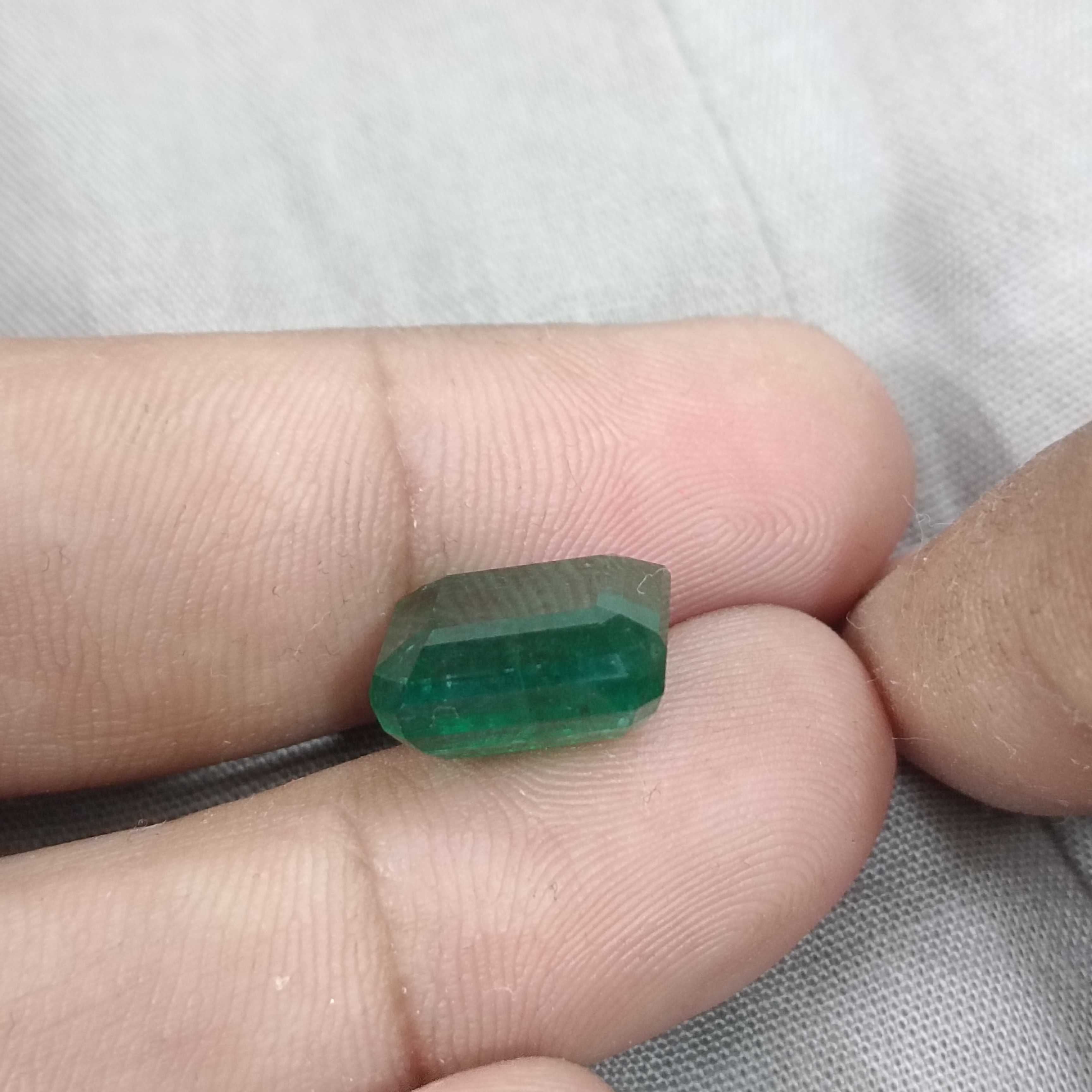 8.89ct vivid green octagon cut Zambian emerald gem