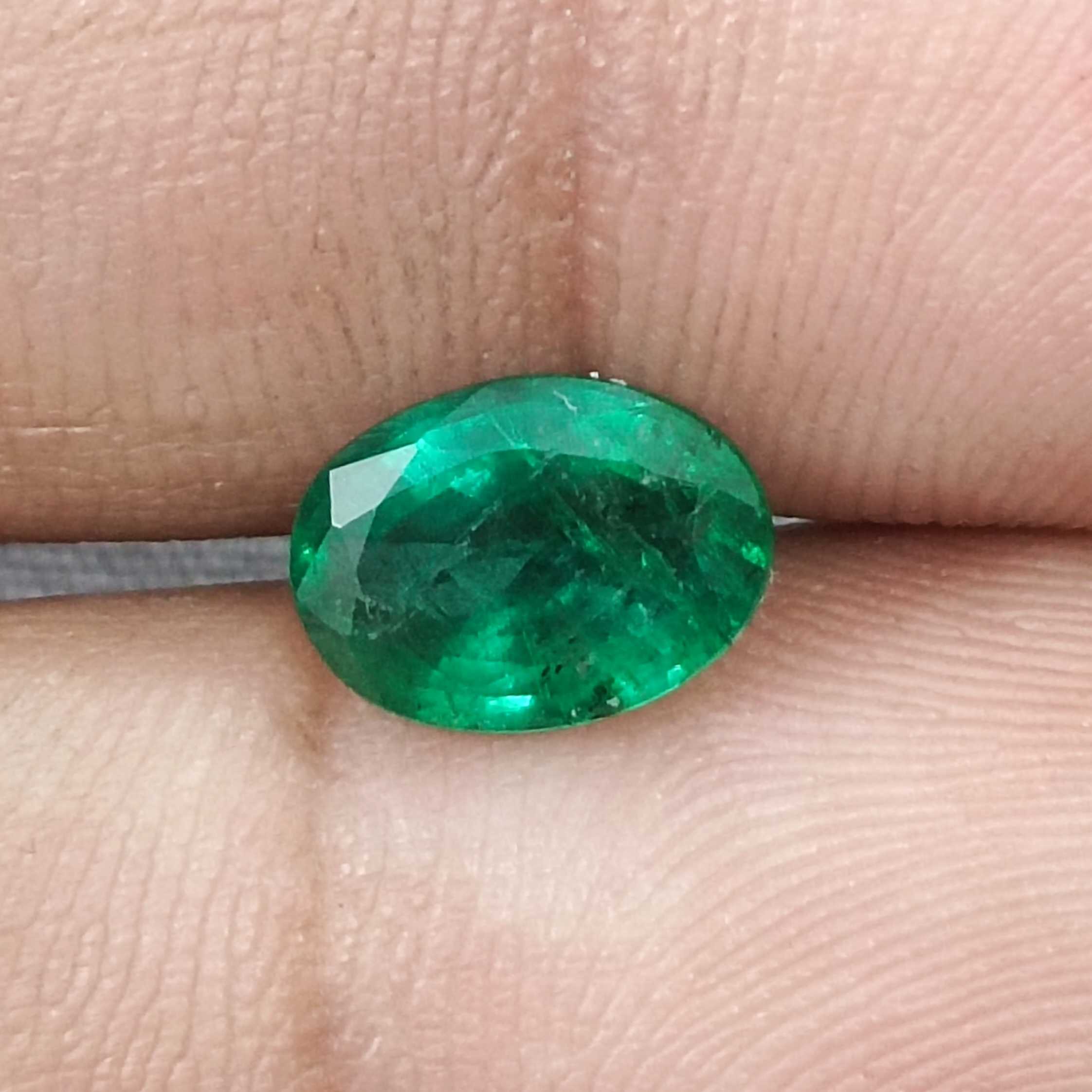 1.64ct deep vivid green oval cut Zambian emerald /