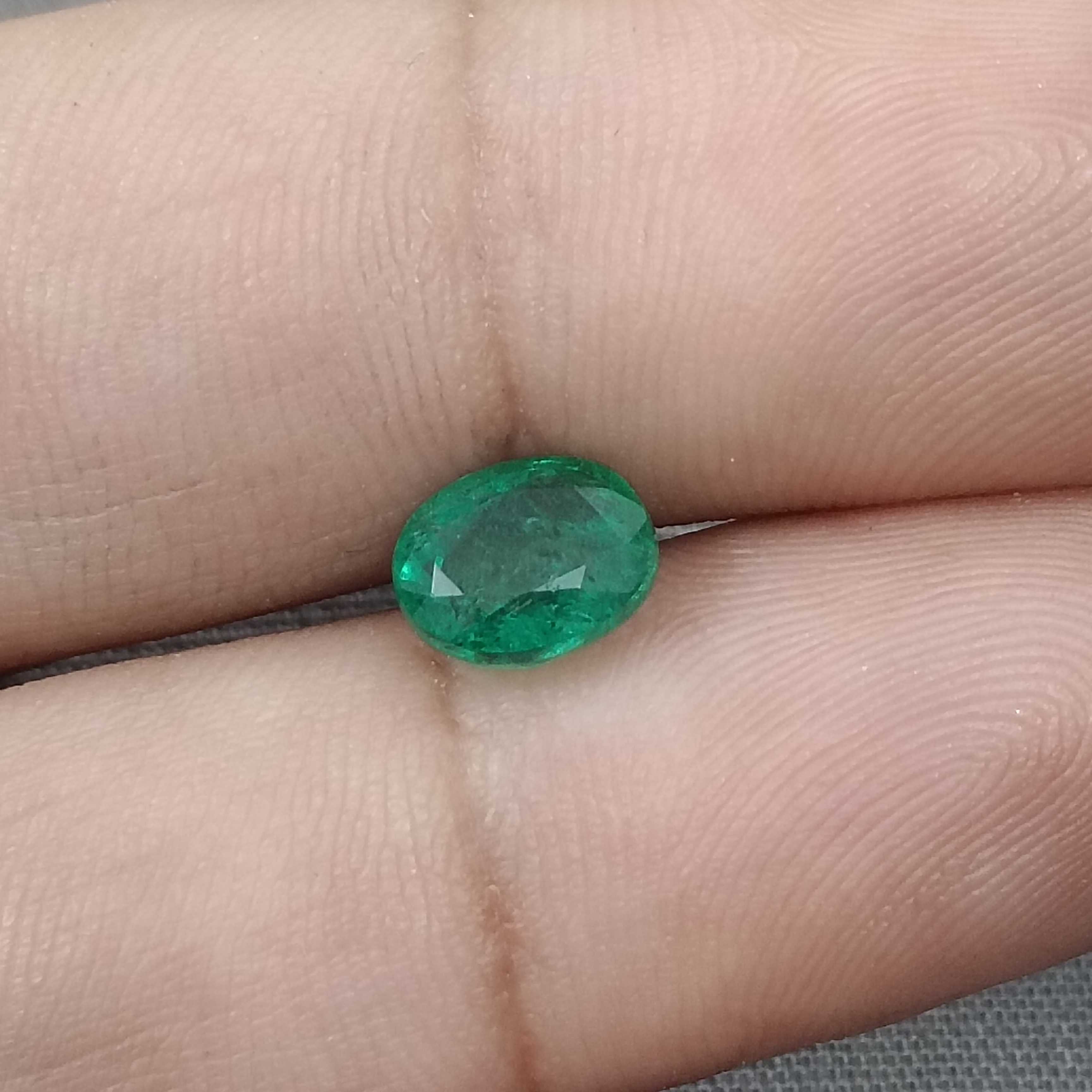 1.61ct GSI deep green color oval cut Zambian origin emerald gemstone 