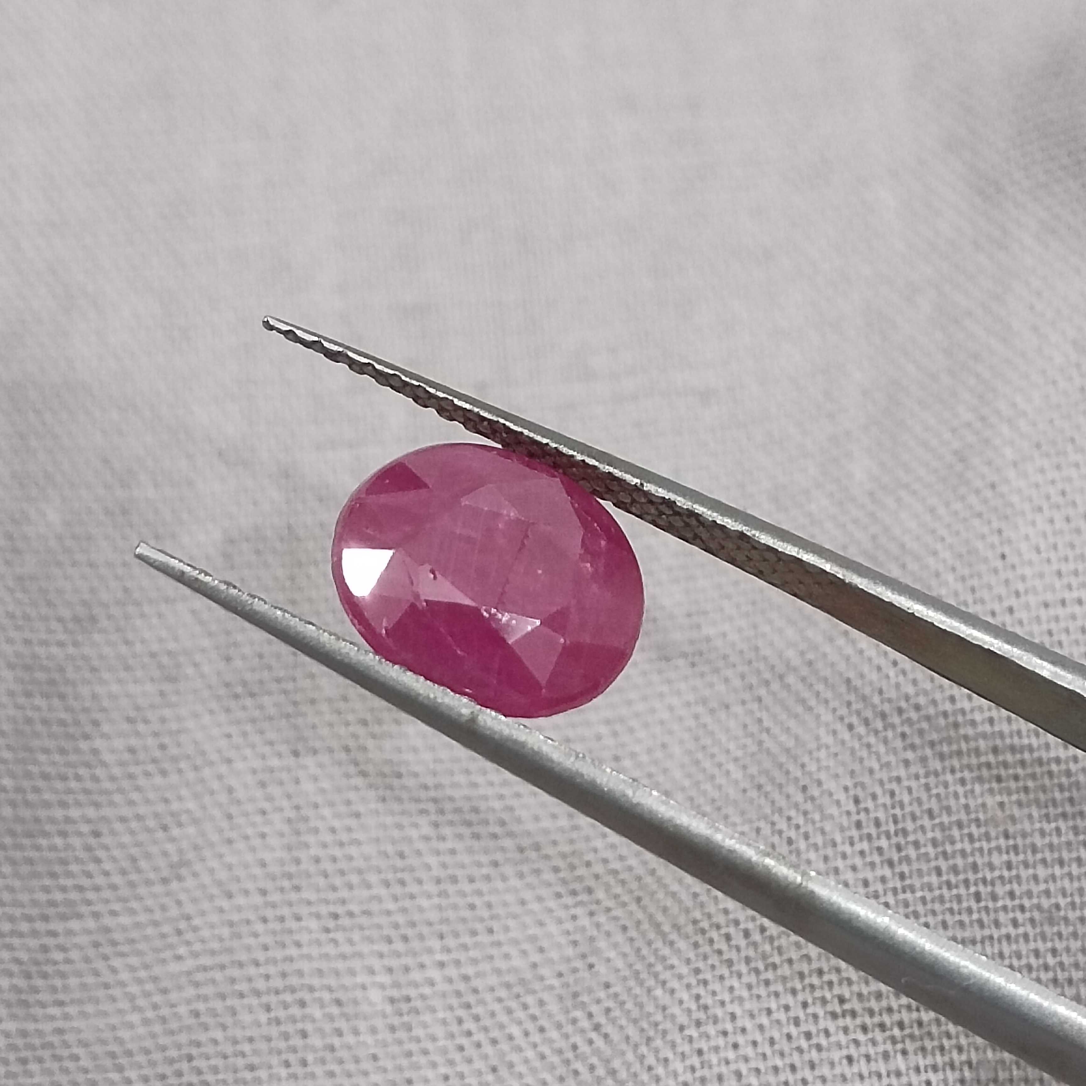 2.35ct GSI certified deep pinkish red oval cut Guiena origin ruby 