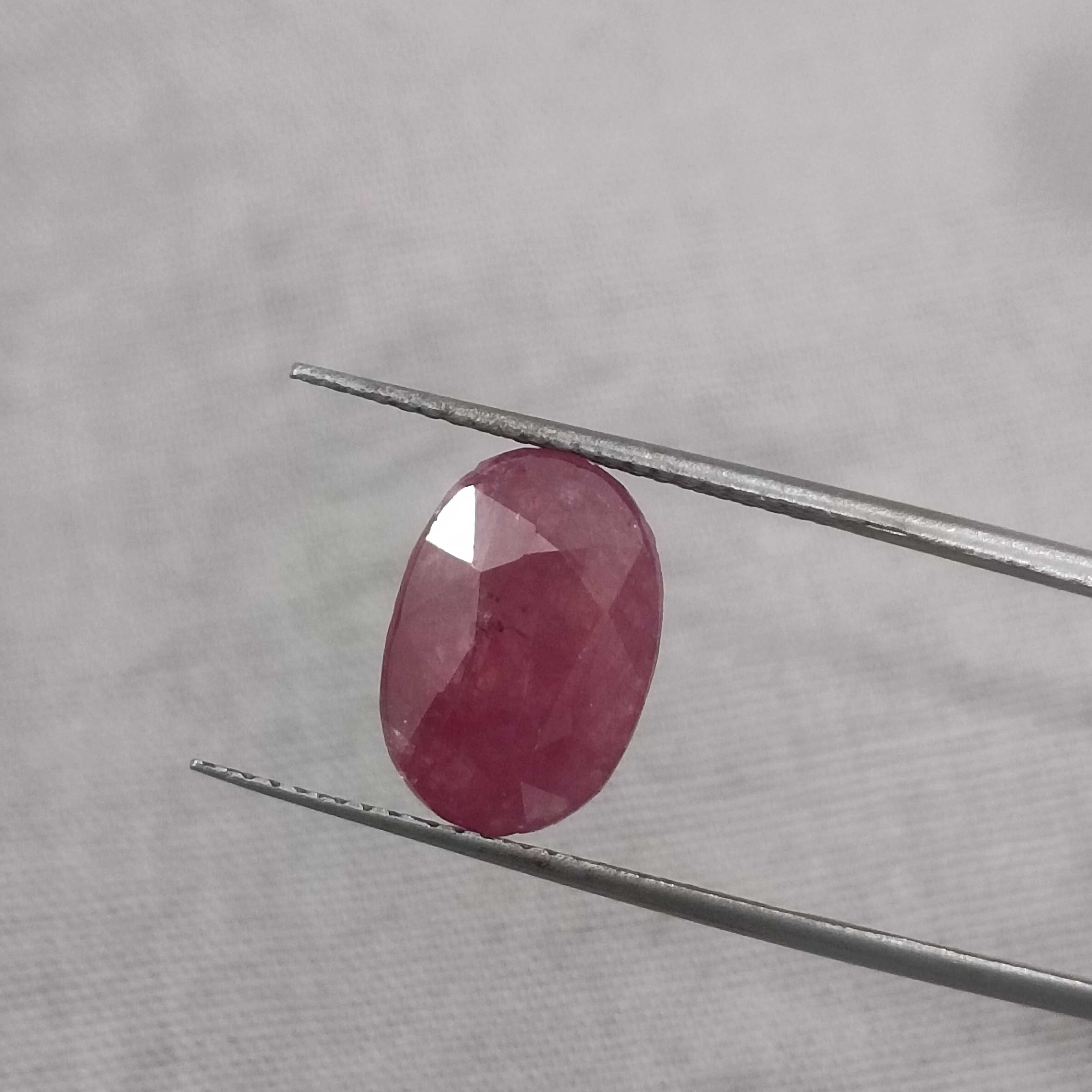 5.56cts IGI certified purplish red oval shape unheated African ruby gemstone