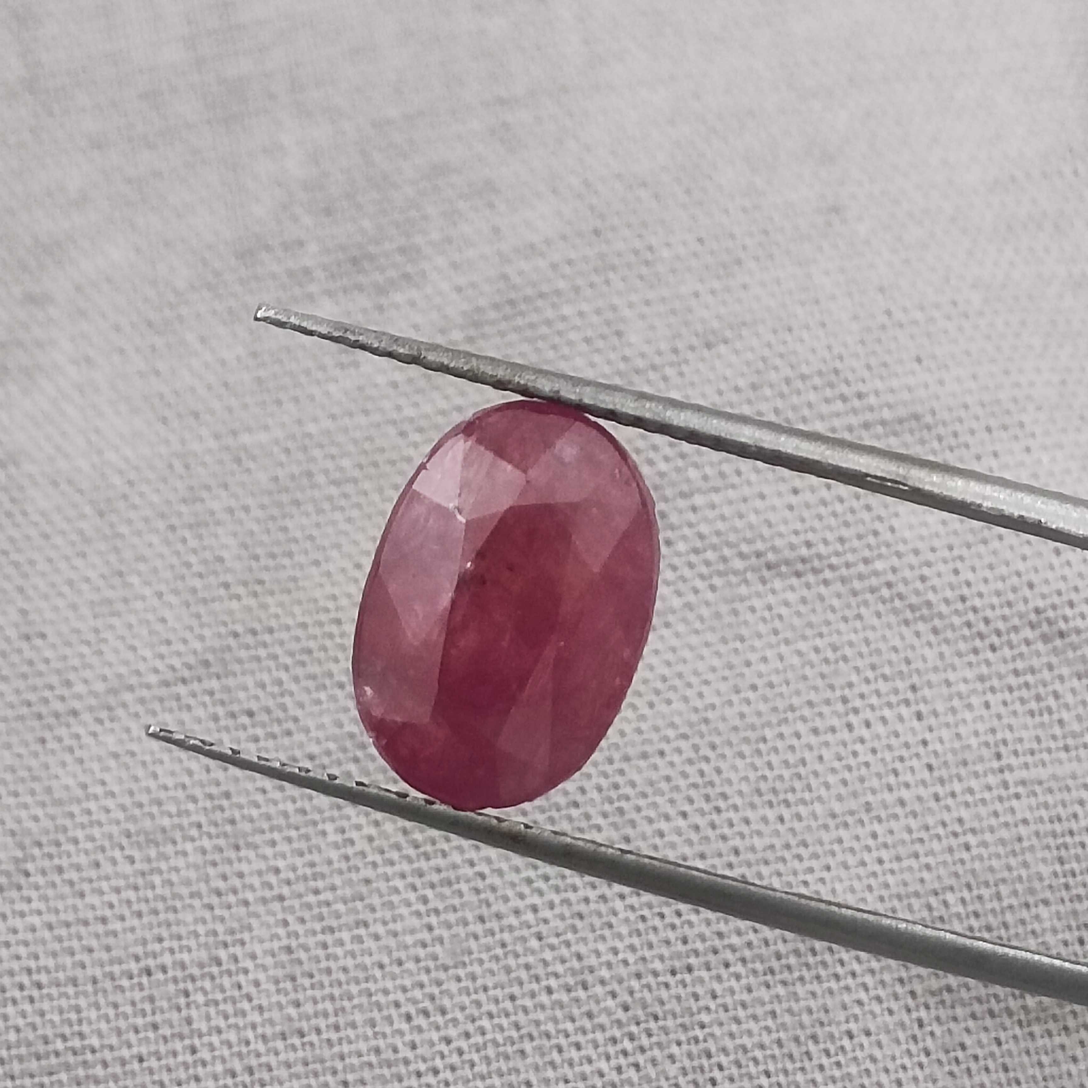 5.56cts IGI certified purplish red oval shape unheated African ruby gemstone