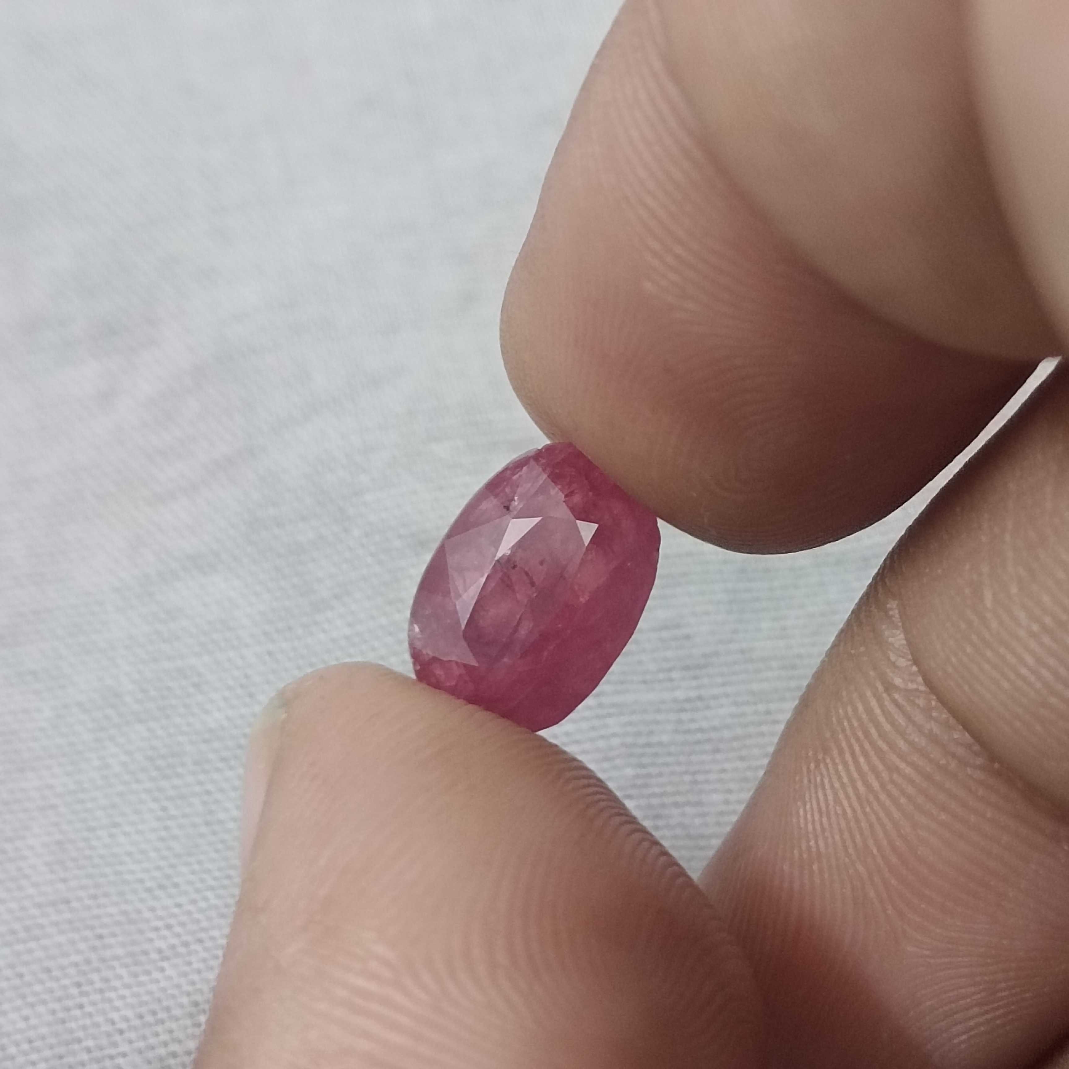 5.56cts IGI certified purplish red oval shape unheated African ruby gemstone