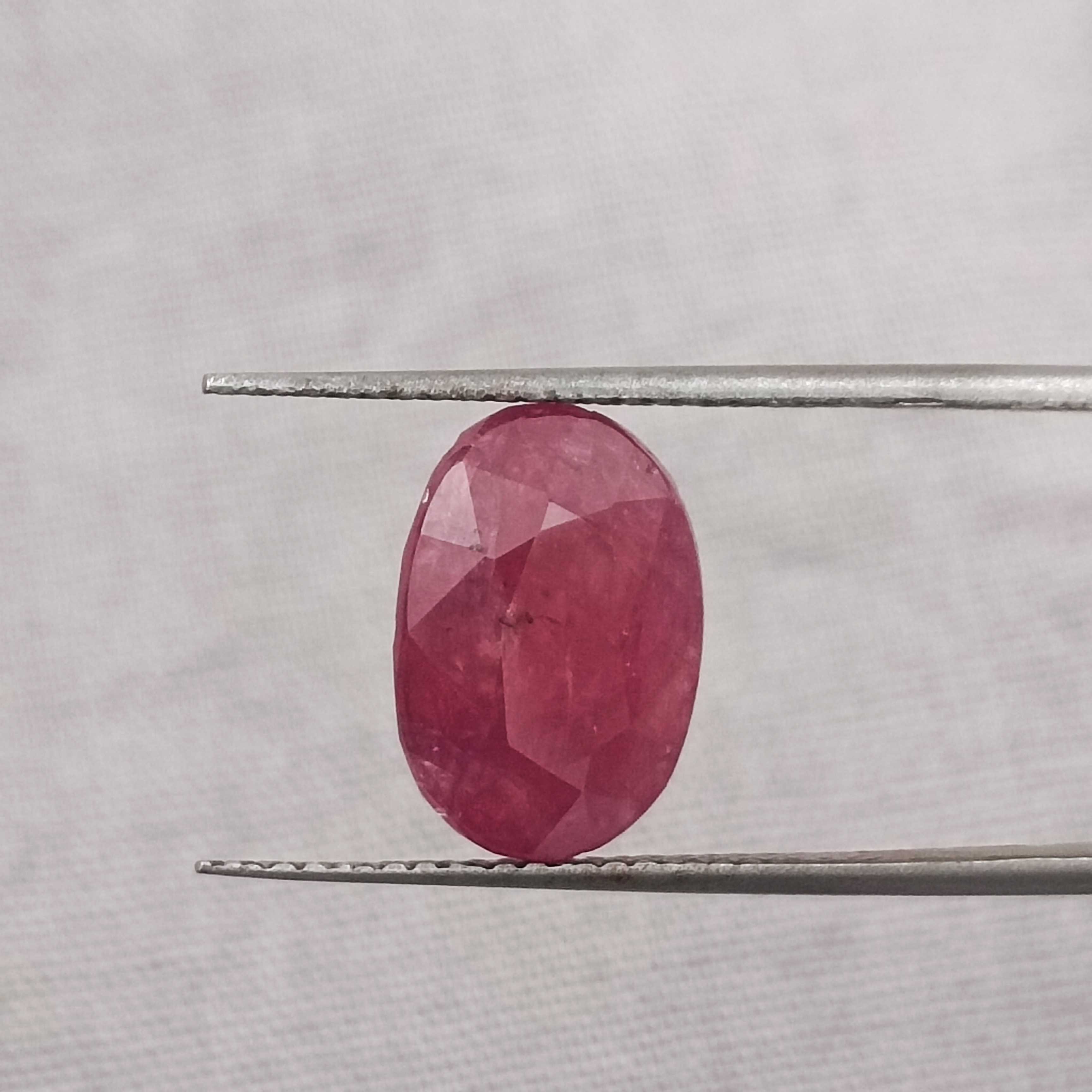 5.56cts IGI certified purplish red oval shape unheated African ruby gemstone