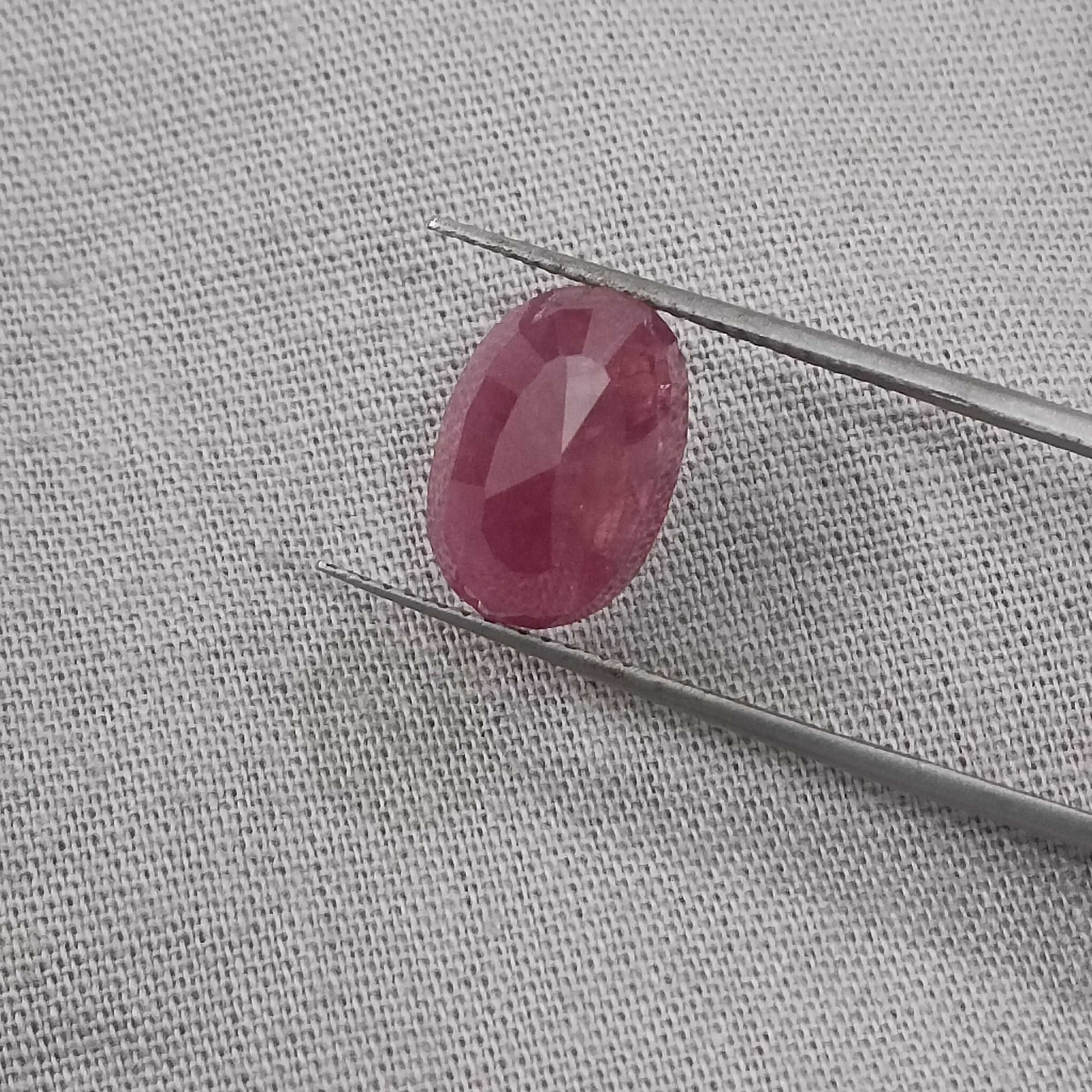 5.56cts IGI certified purplish red oval shape unheated African ruby gemstone