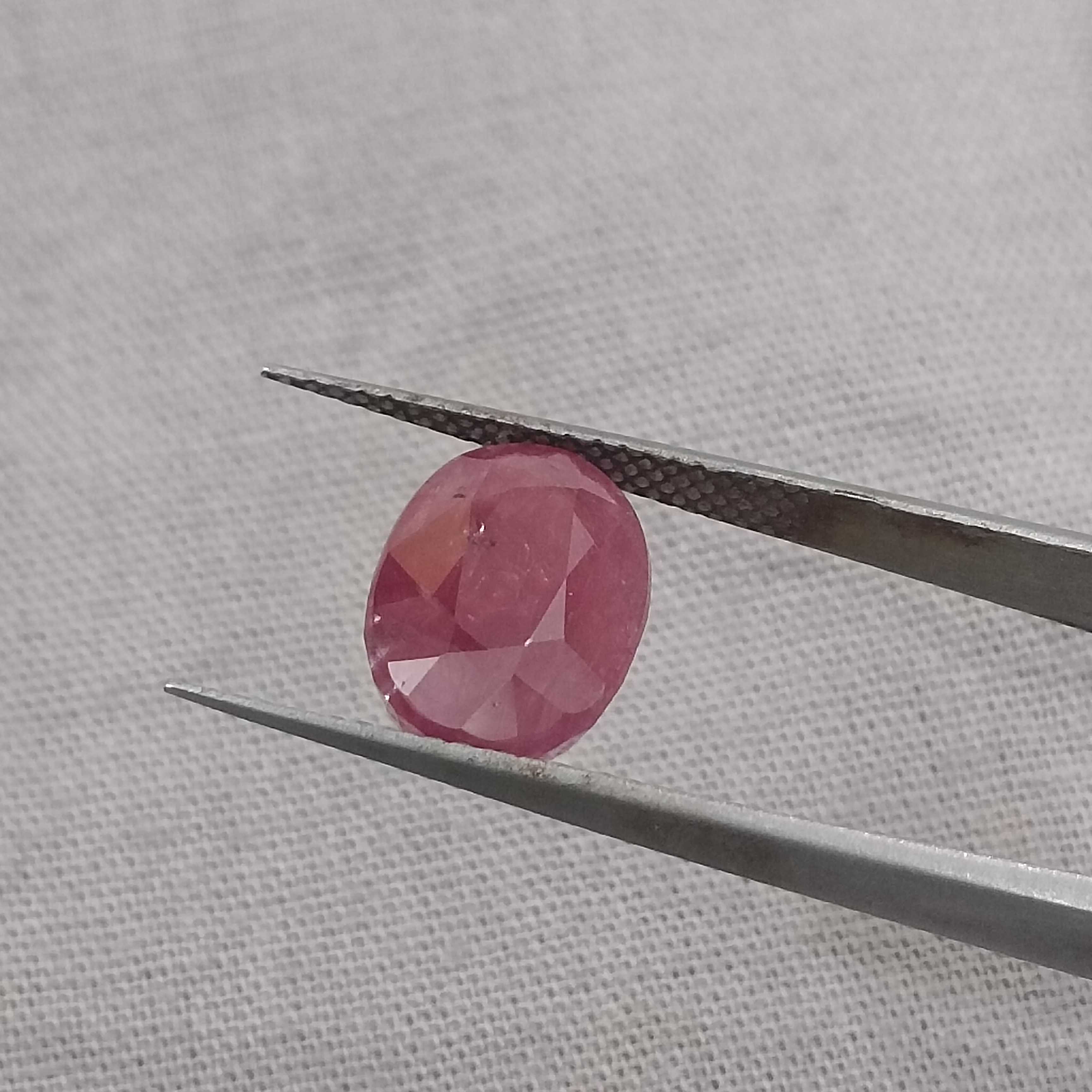 5.56cts IGI certified purplish red oval shape unheated African ruby gemstone