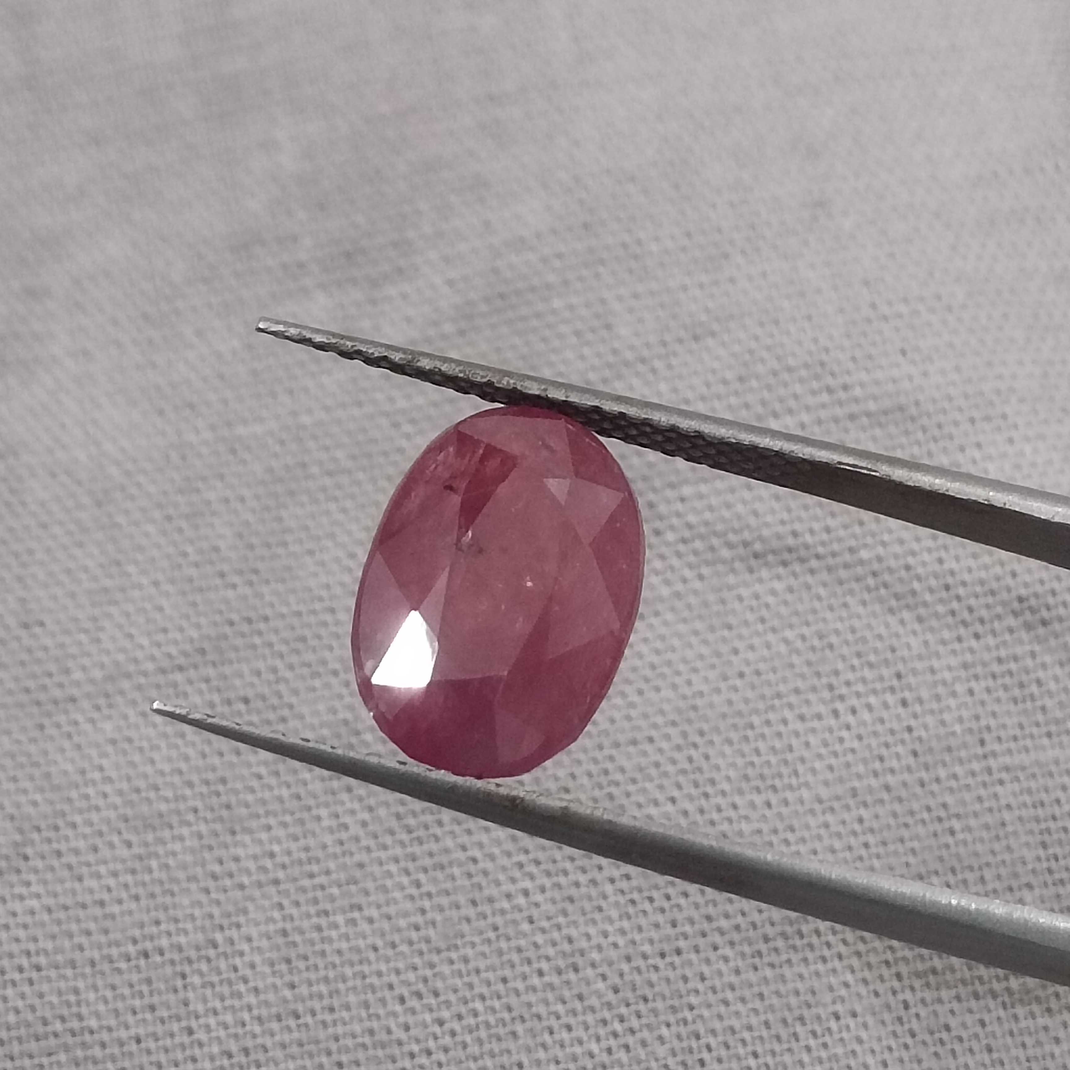 5.56cts IGI certified purplish red oval shape unheated African ruby gemstone
