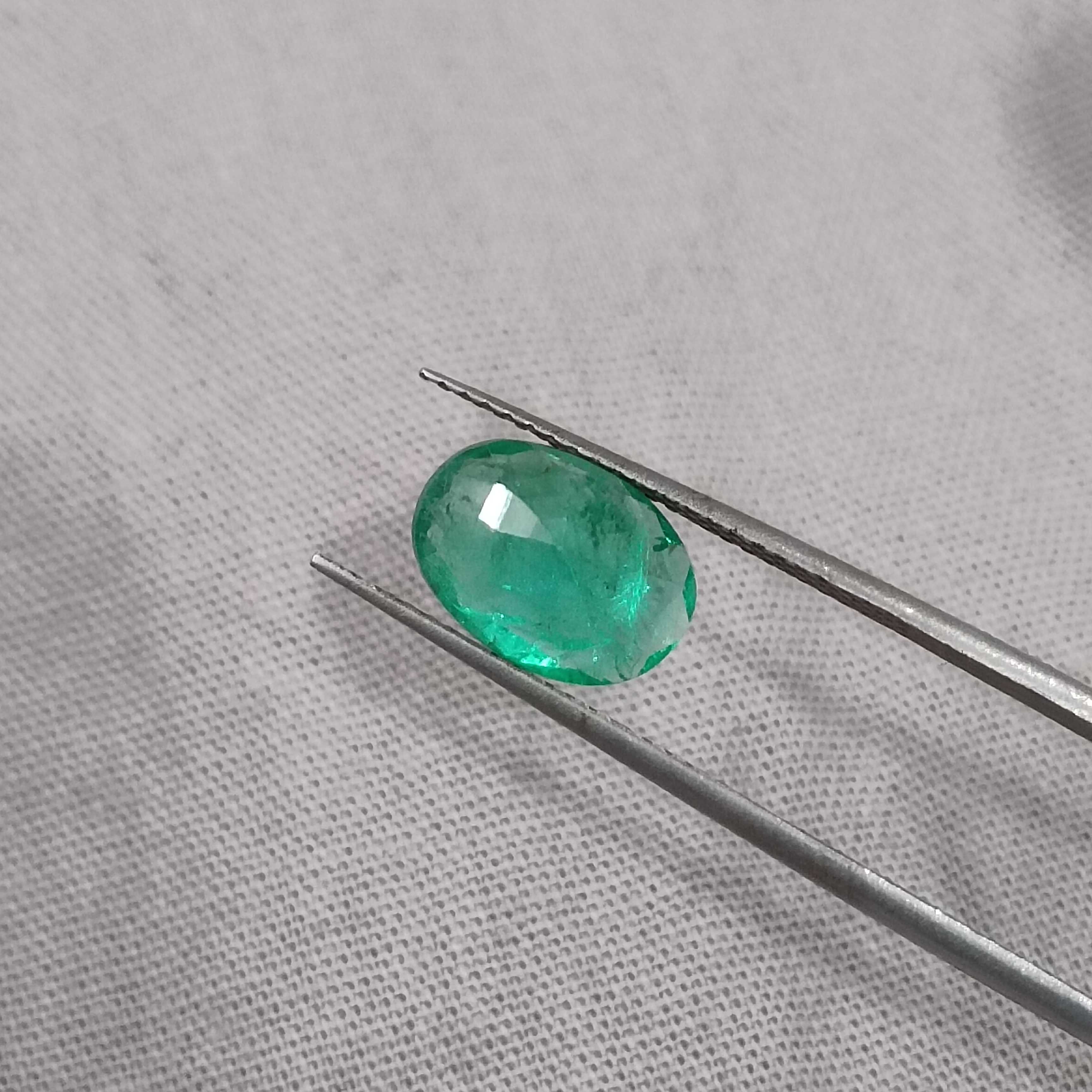 1.85cts certified medium vivid green oval cut Swat emerald gem