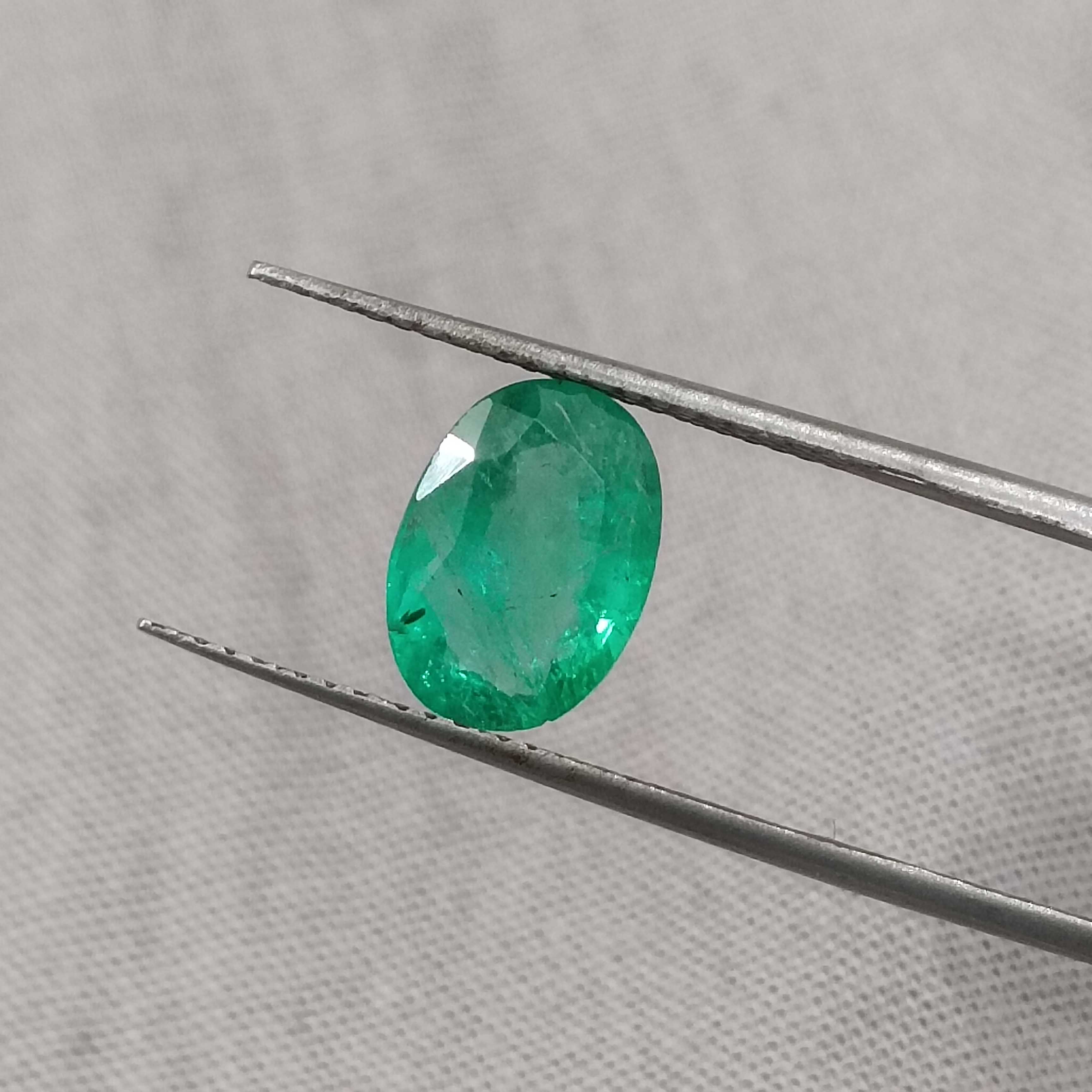 1.85cts certified medium vivid green oval cut Swat emerald gem