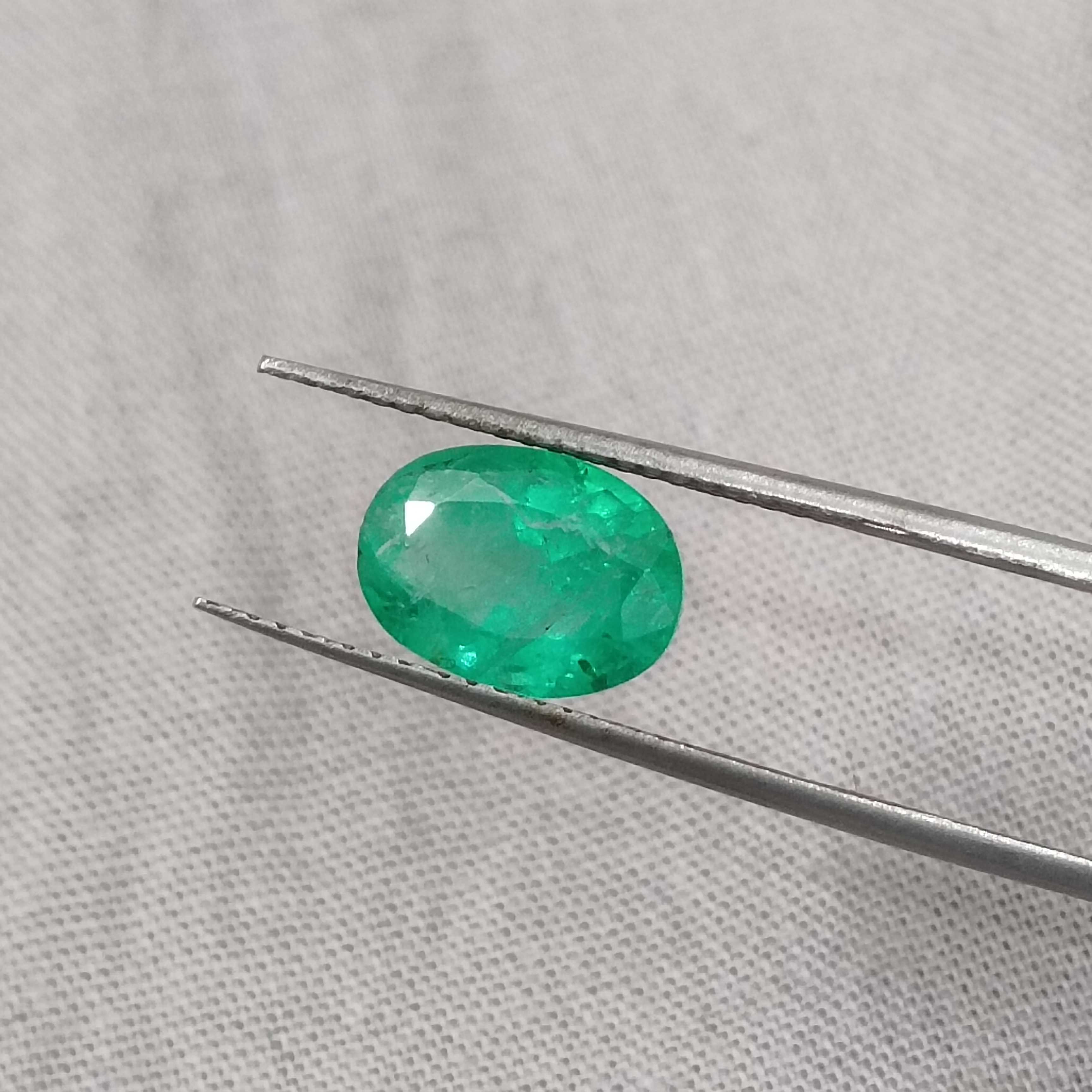 1.85cts certified medium vivid green oval cut Swat emerald gem