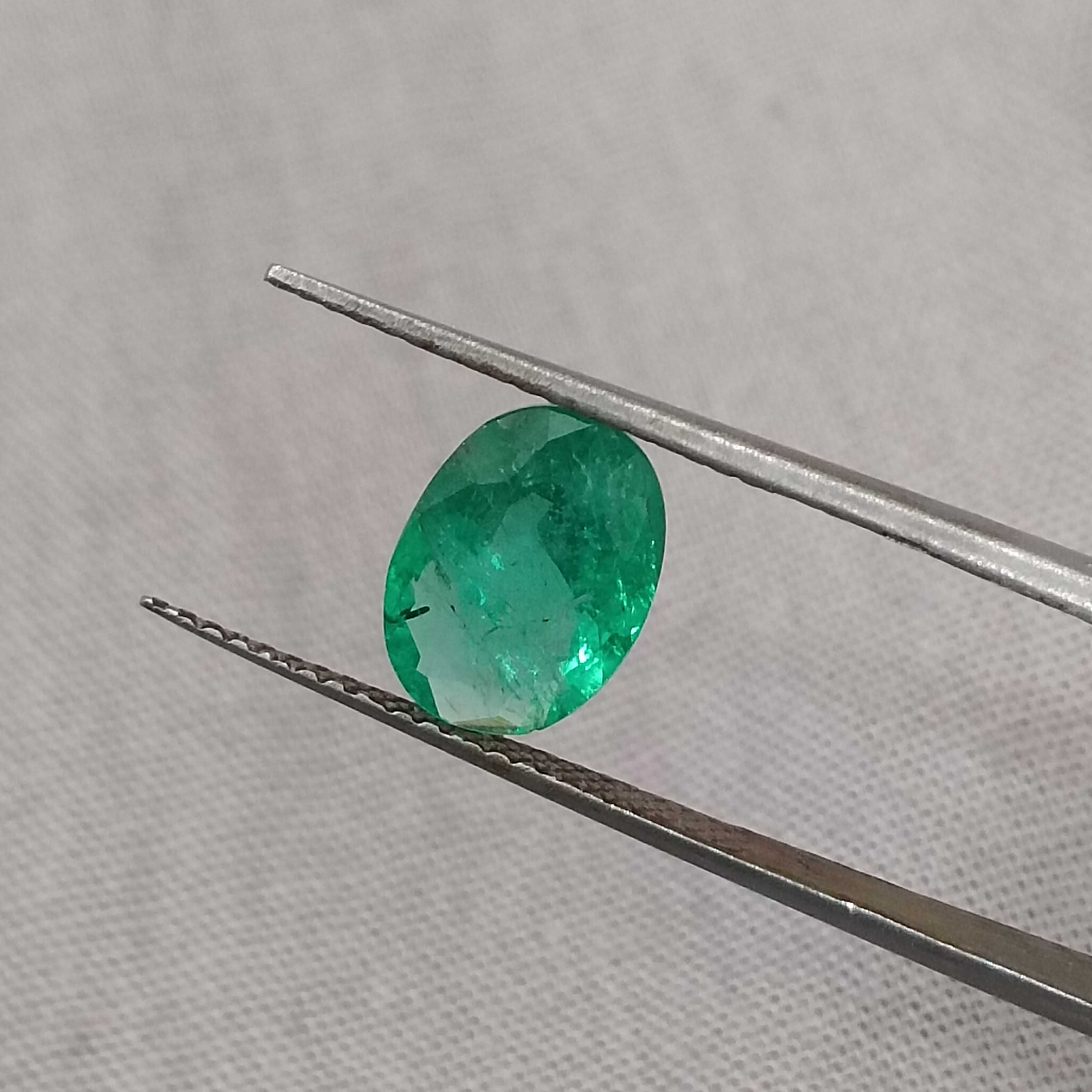 1.85cts certified medium vivid green oval cut Swat emerald gem
