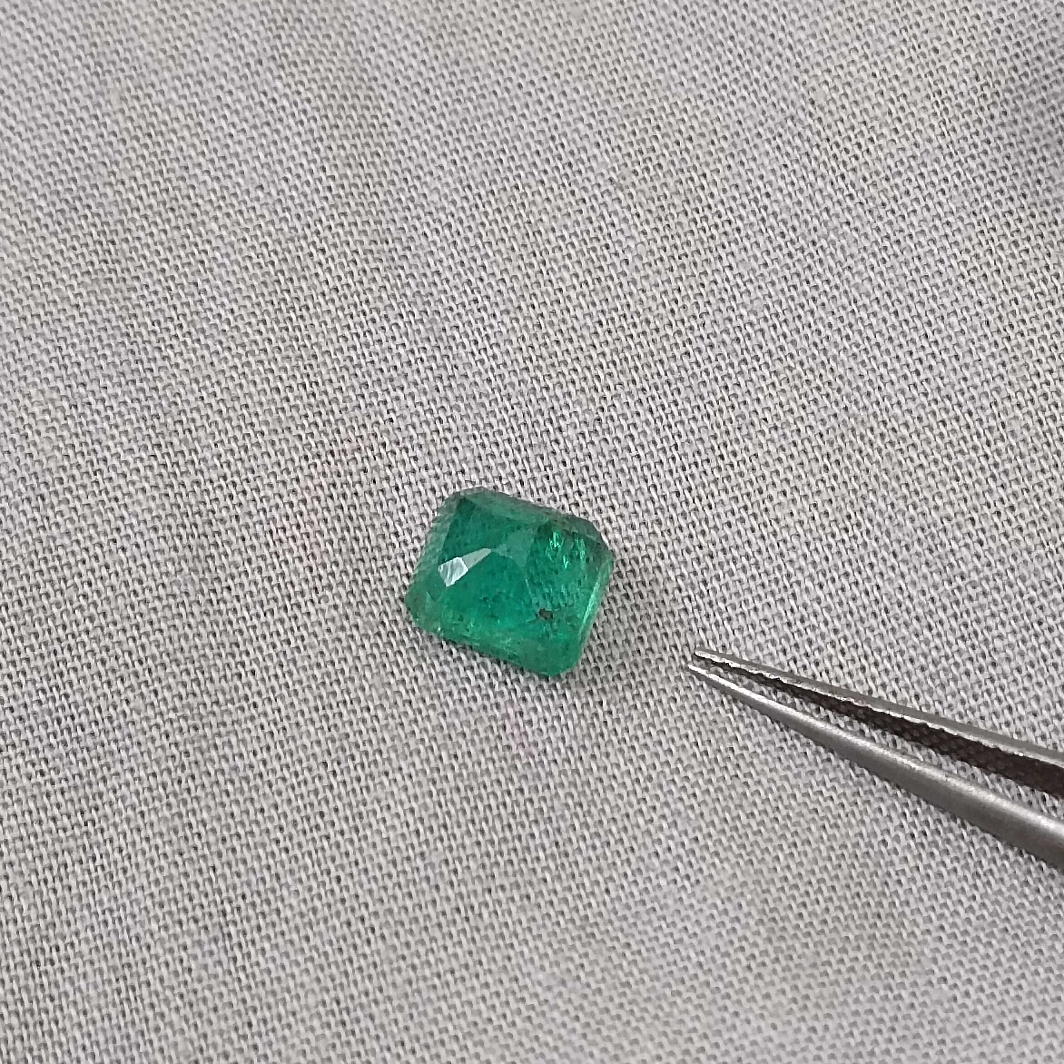 1.85ct GSI certified medium deep golden green octagon cut Swat emerald gem