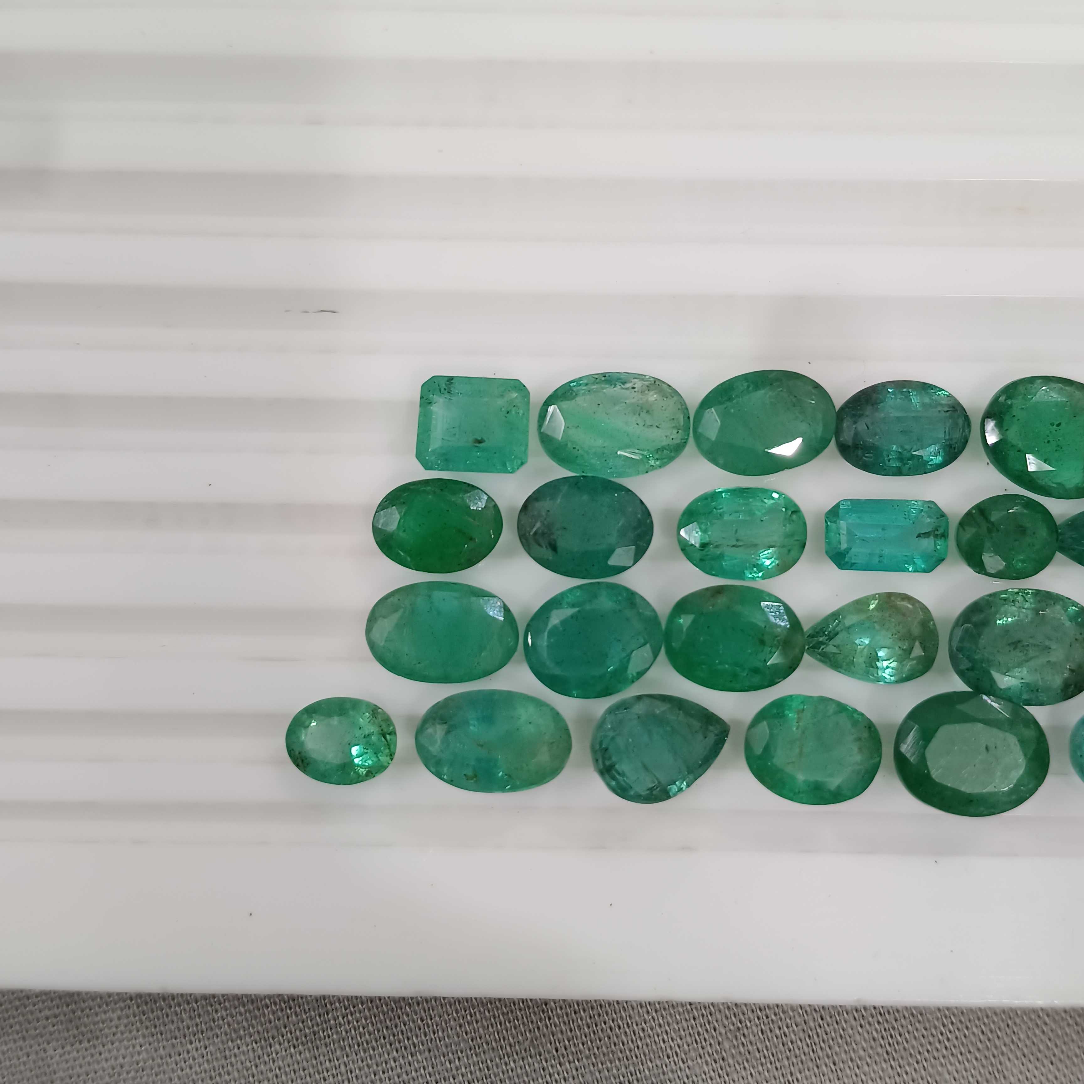 42.5ct medium to deep color multi shape emerald gemstone lot