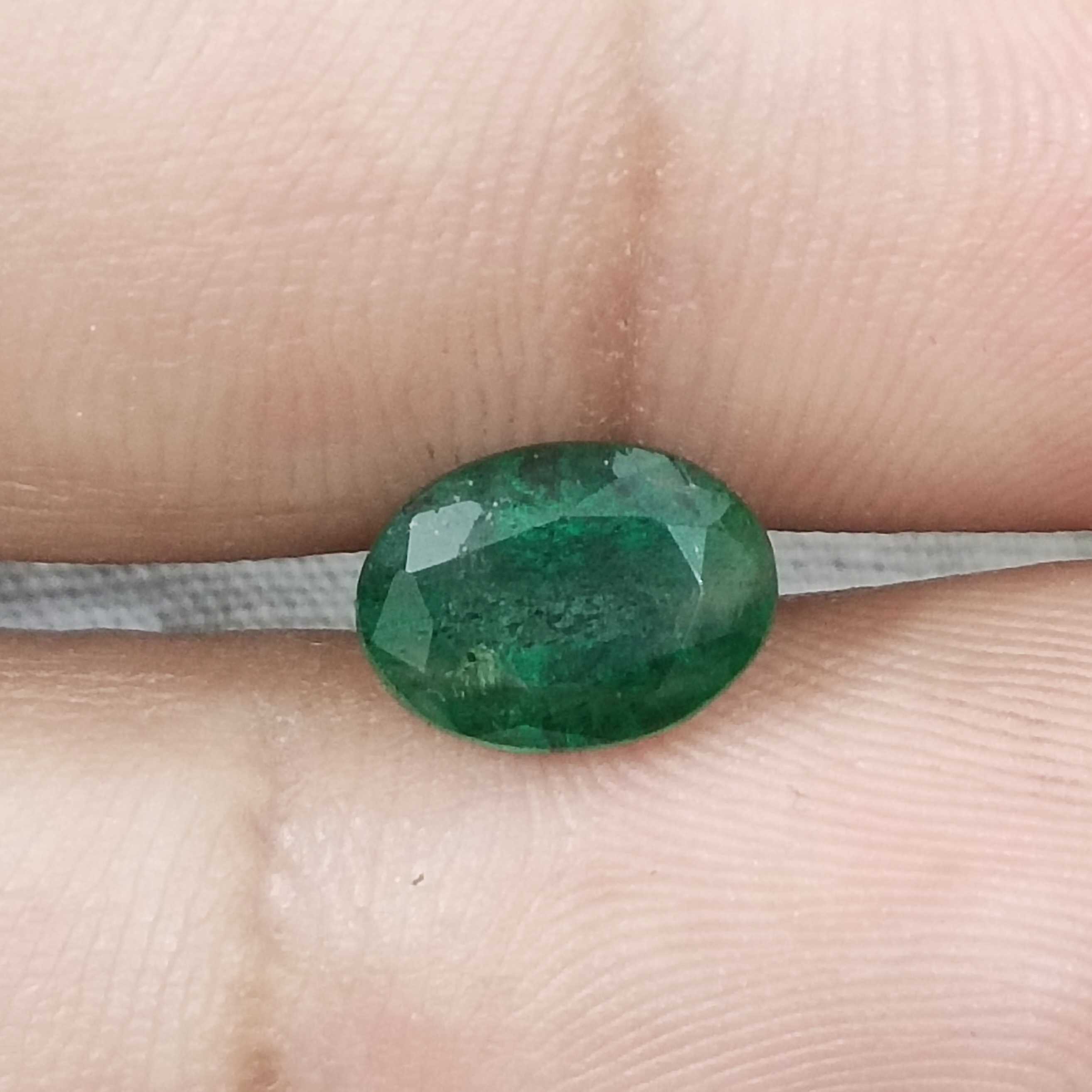 2.24cts drak green colour oval cut Zambian emerald stone 