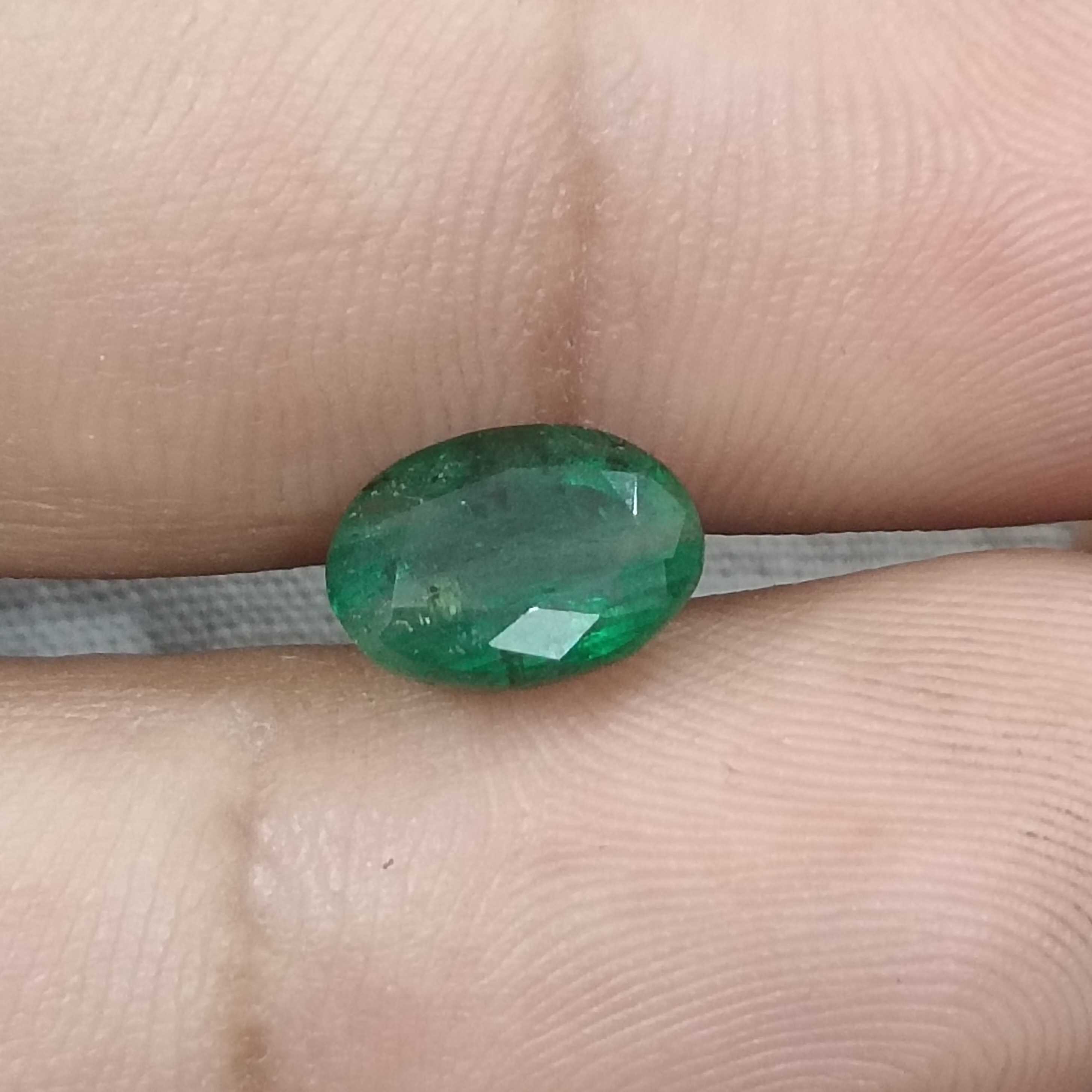 2.24cts drak green colour oval cut Zambian emerald stone 