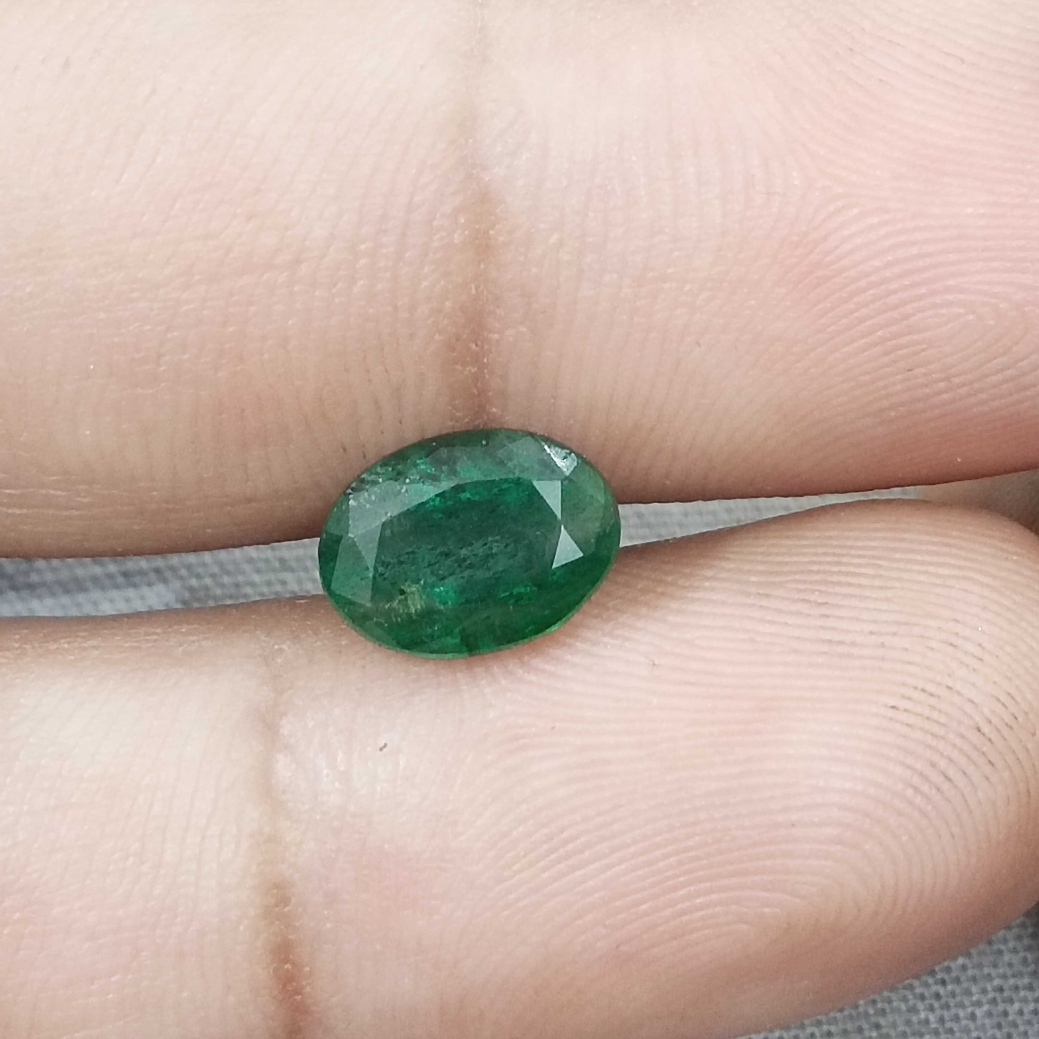 2.24cts drak green colour oval cut Zambian emerald stone 