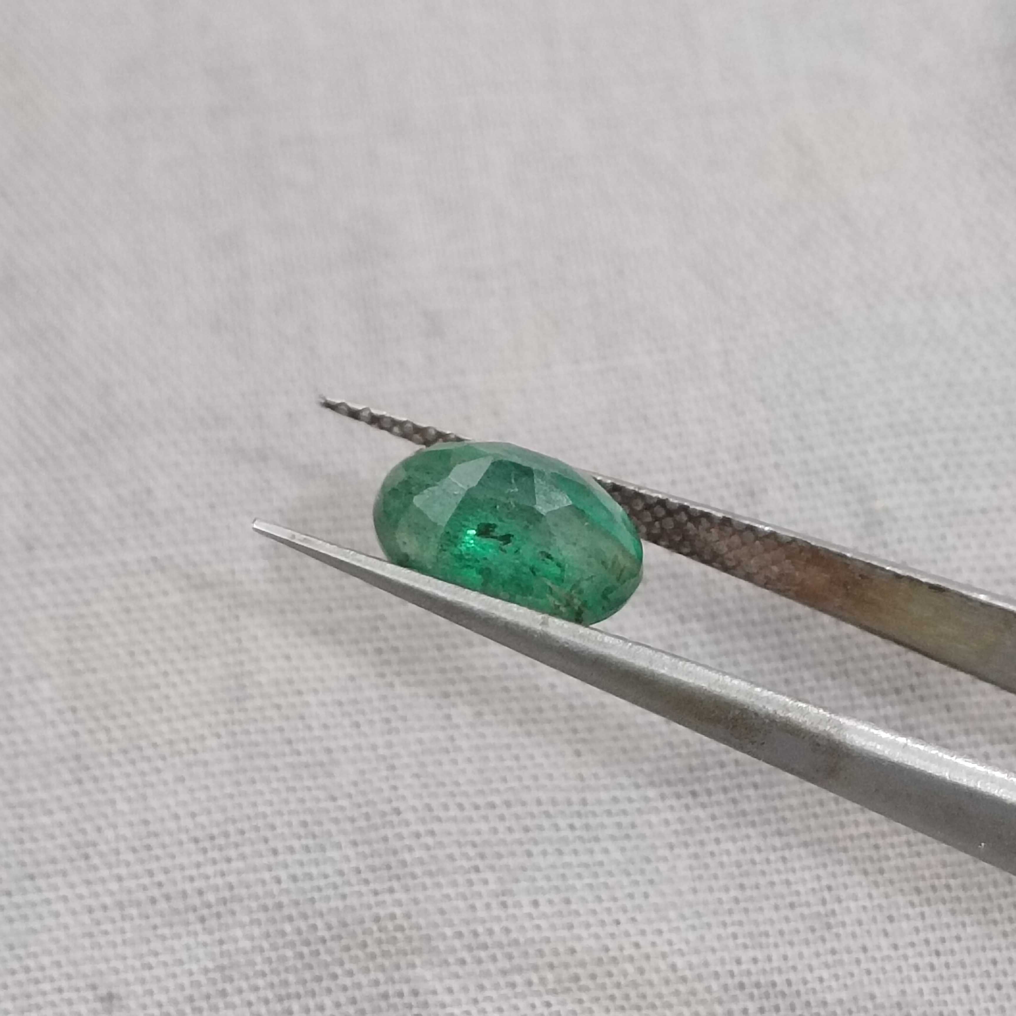 2.24cts drak green colour oval cut Zambian emerald stone 