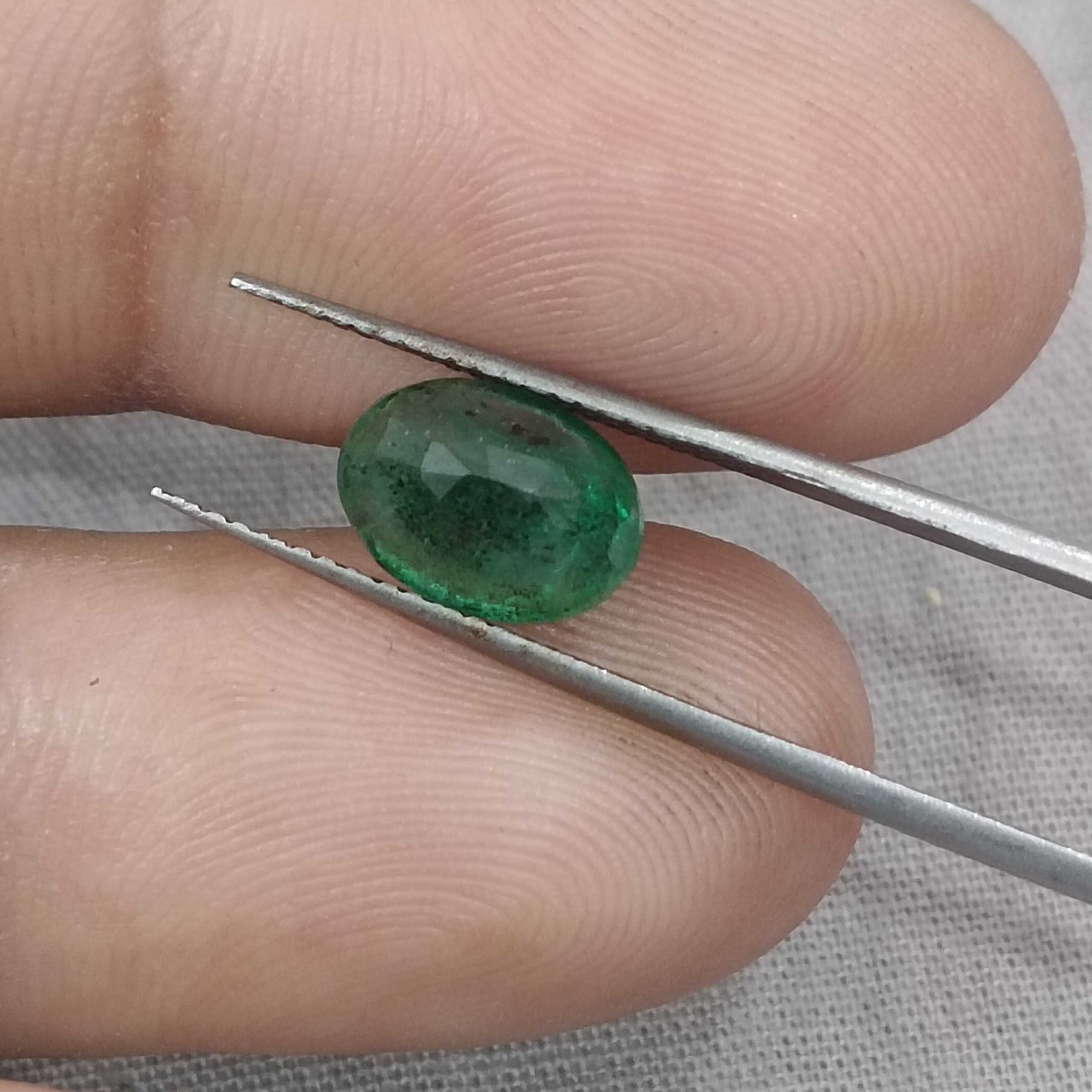 2.24cts drak green colour oval cut Zambian emerald stone 
