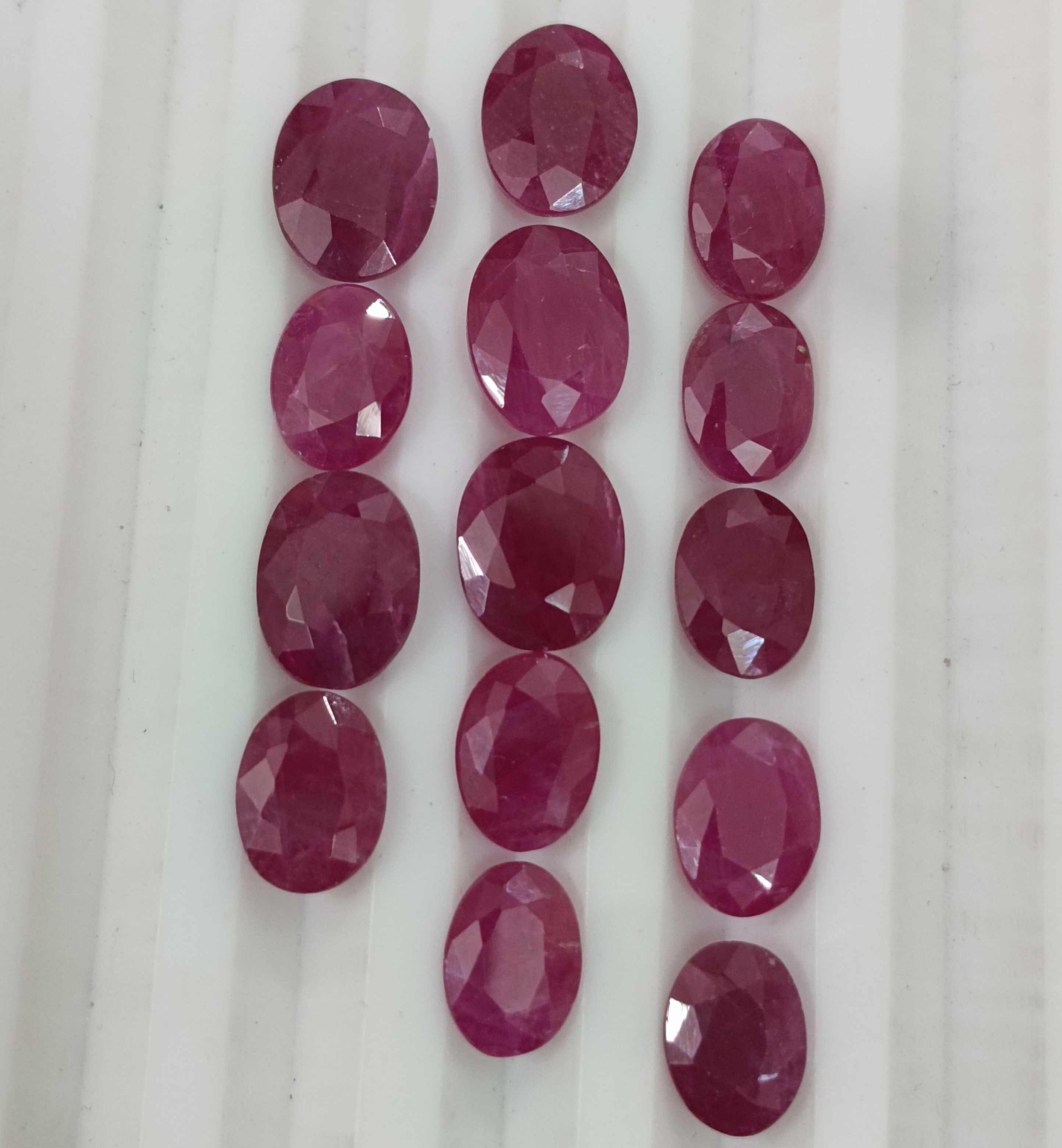 22.38cts purplish red oval cut untreated African ruby stone parcel /
