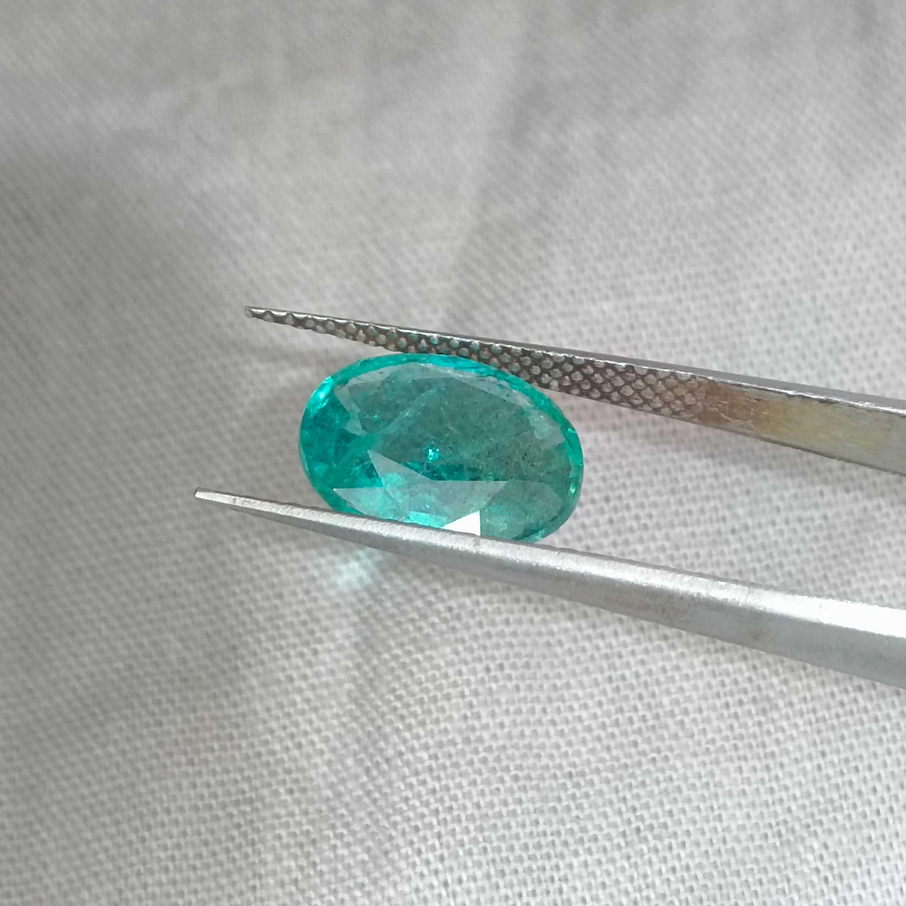 2.93cts certified bluish medium green oval cut emerald 