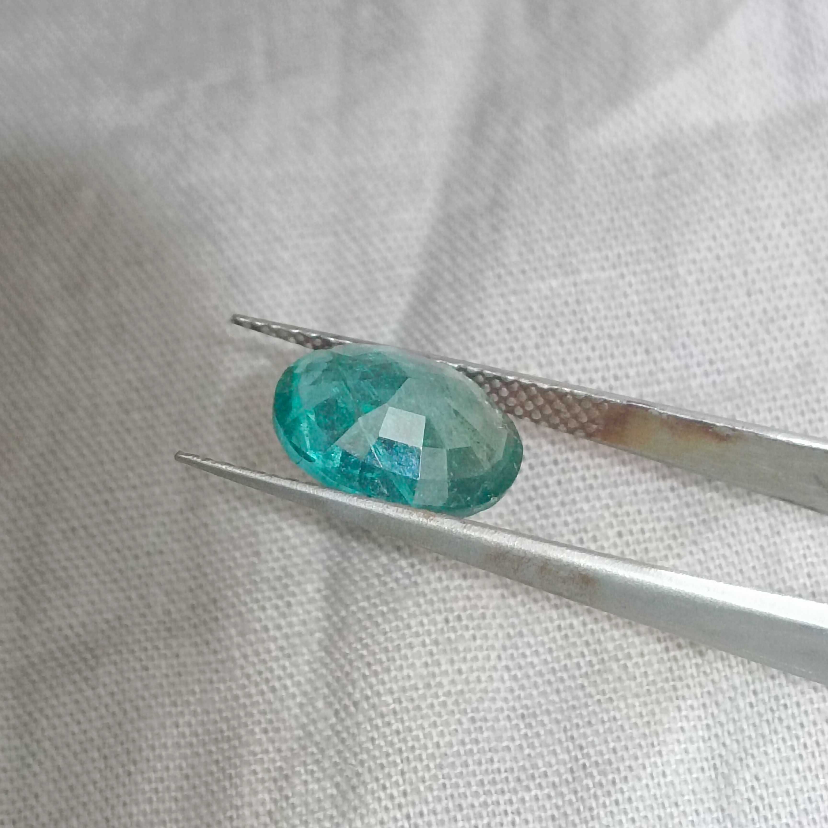 2.93cts certified bluish medium green oval cut emerald 