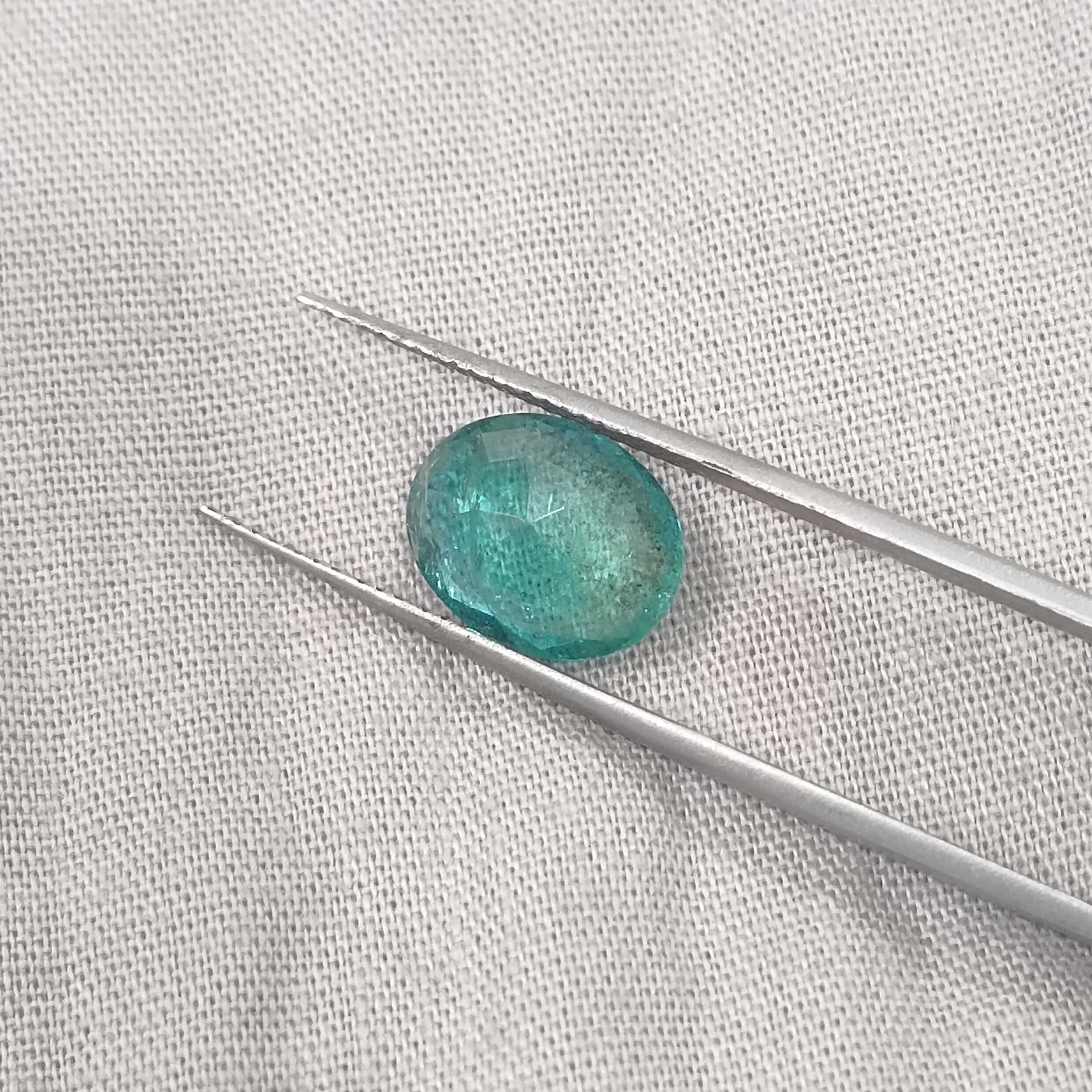2.93cts certified bluish medium green oval cut emerald 