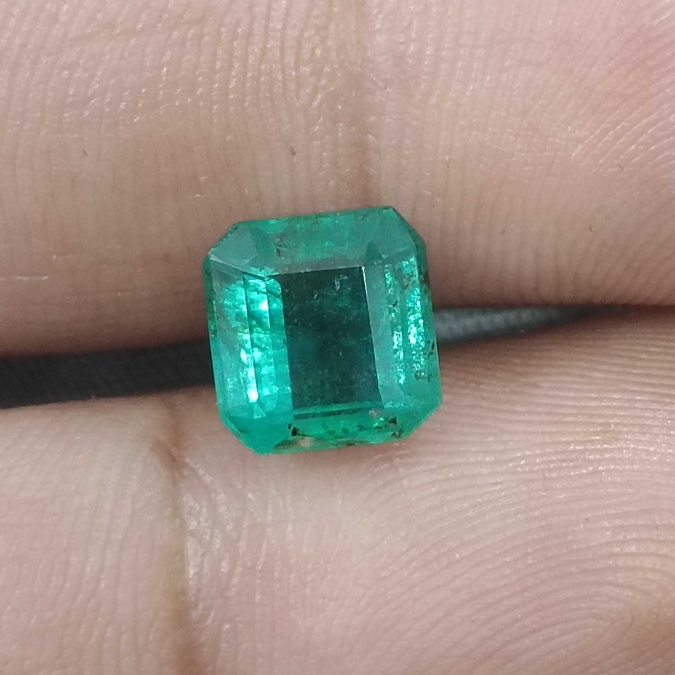 2.61cts certified natural medium deep green octagon step cut emerald stone