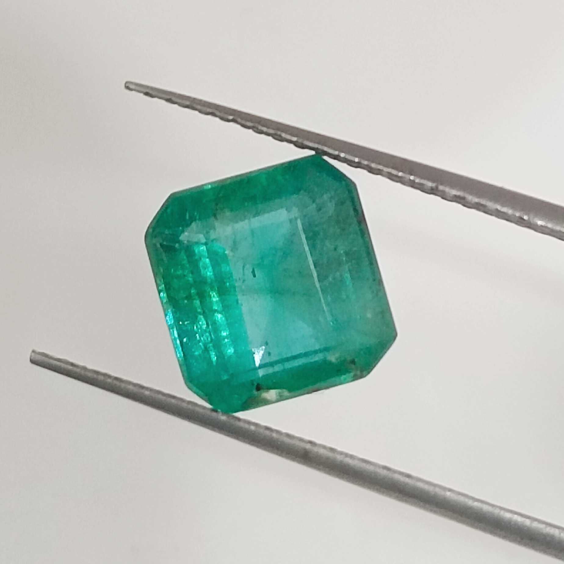 2.61cts certified natural medium deep green octagon step cut emerald stone