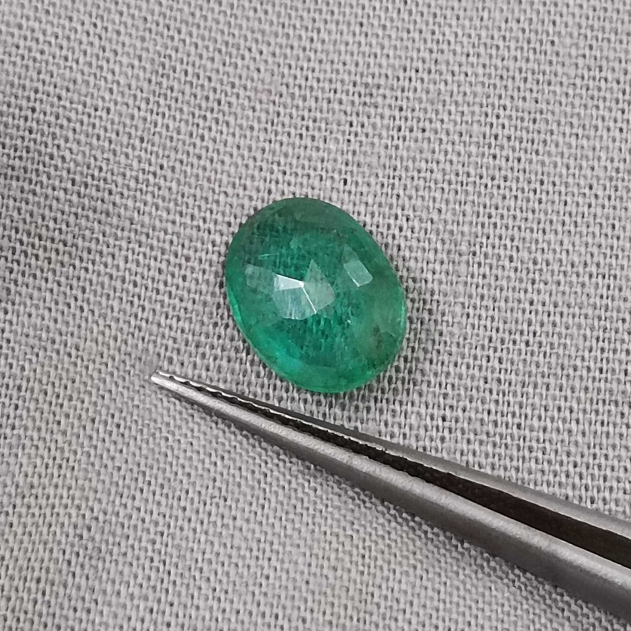 1.91cts certified medium golden green oval cut Swat emerald gemstone 