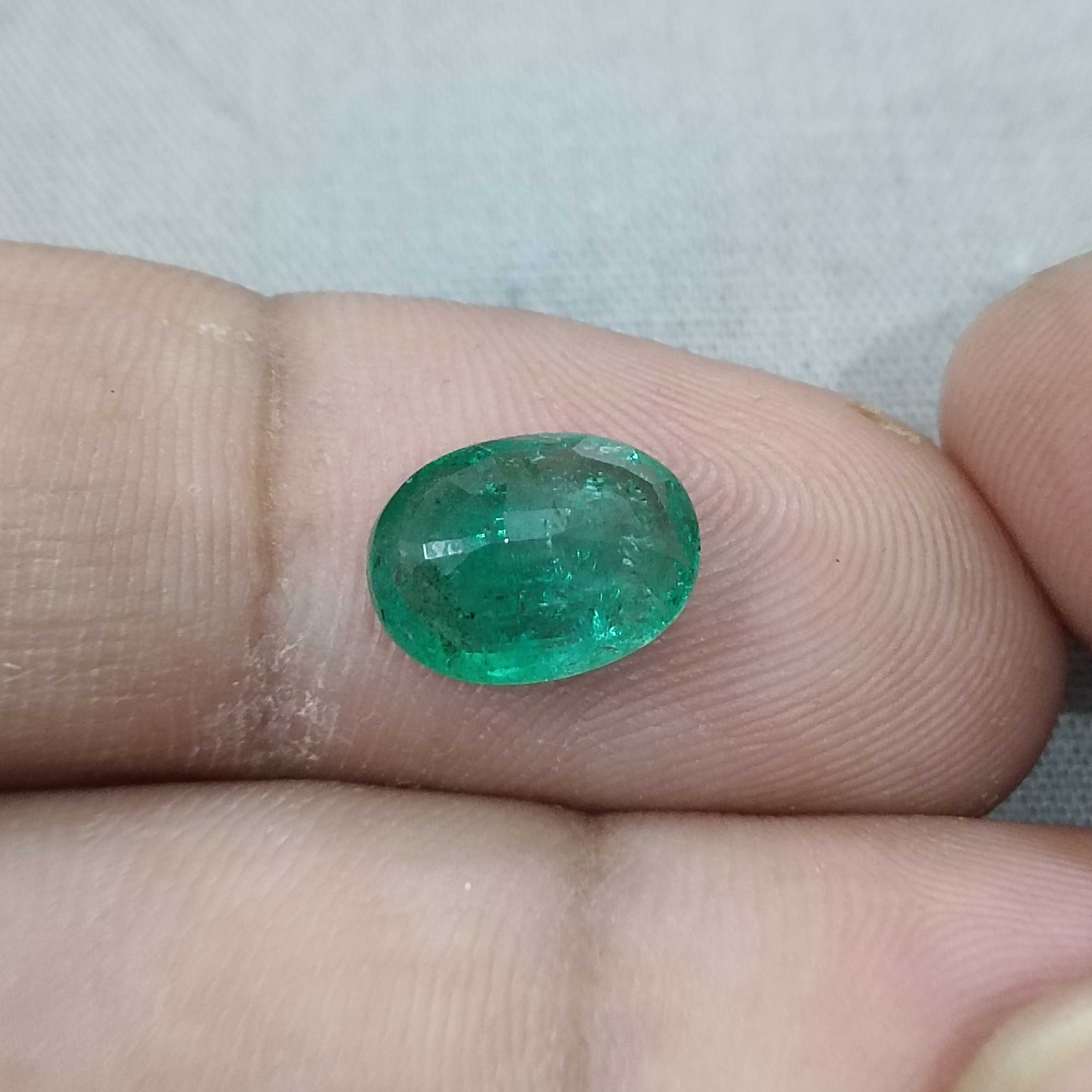2.68cts GSI certified vivid golden green colour oval cut Zambian emerald