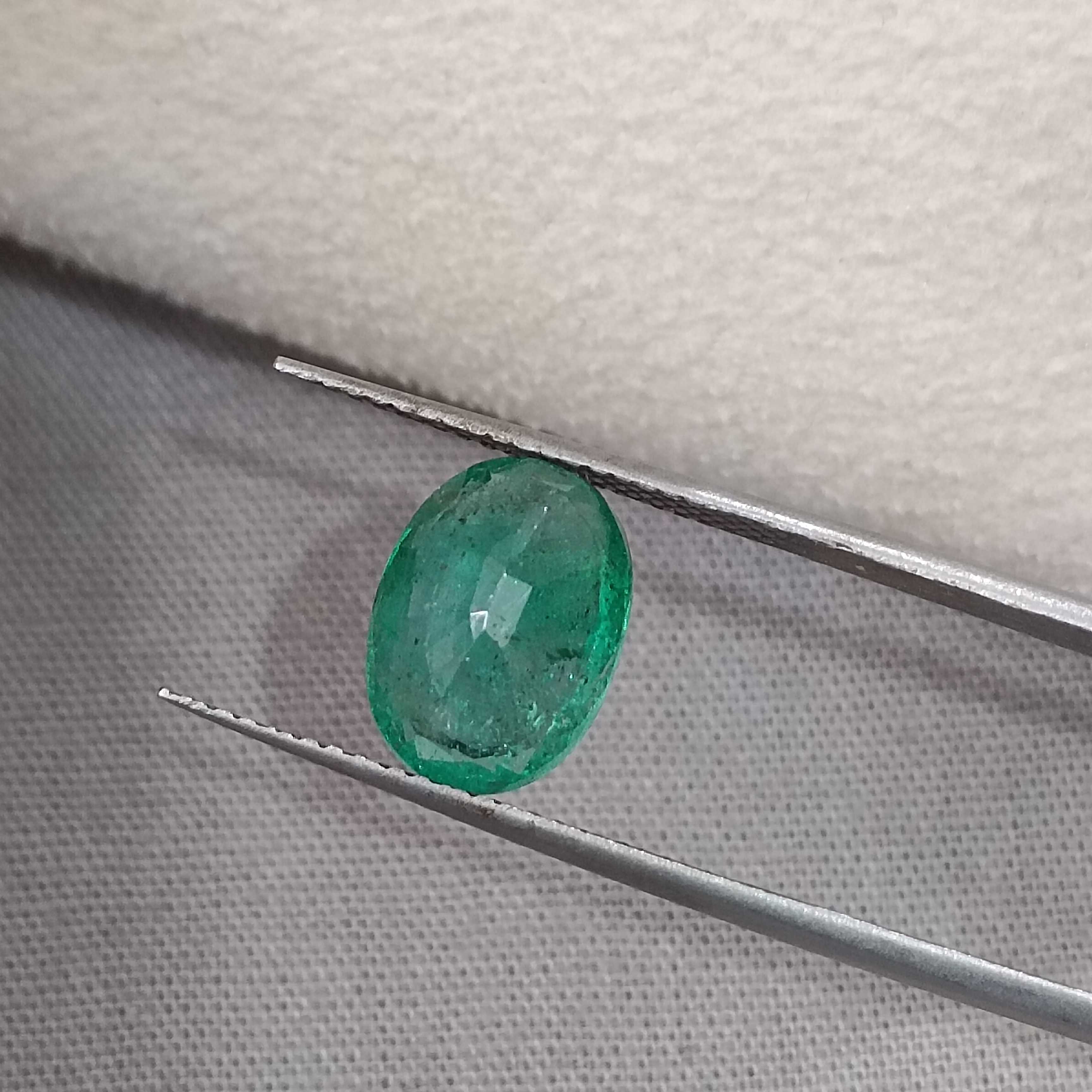 2.68cts GSI certified vivid golden green colour oval cut Zambian emerald