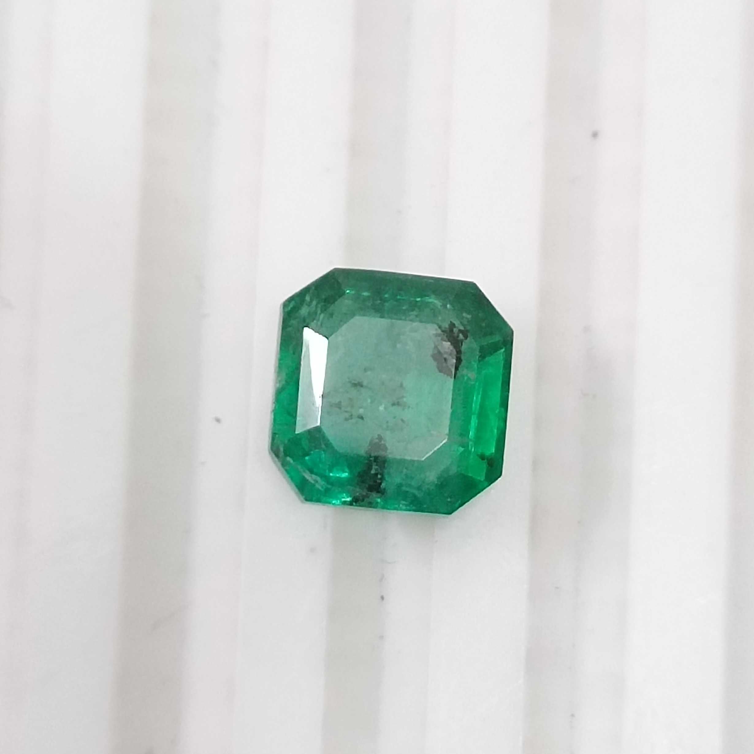 2.43cts certified grass green color octagon cut emerald 