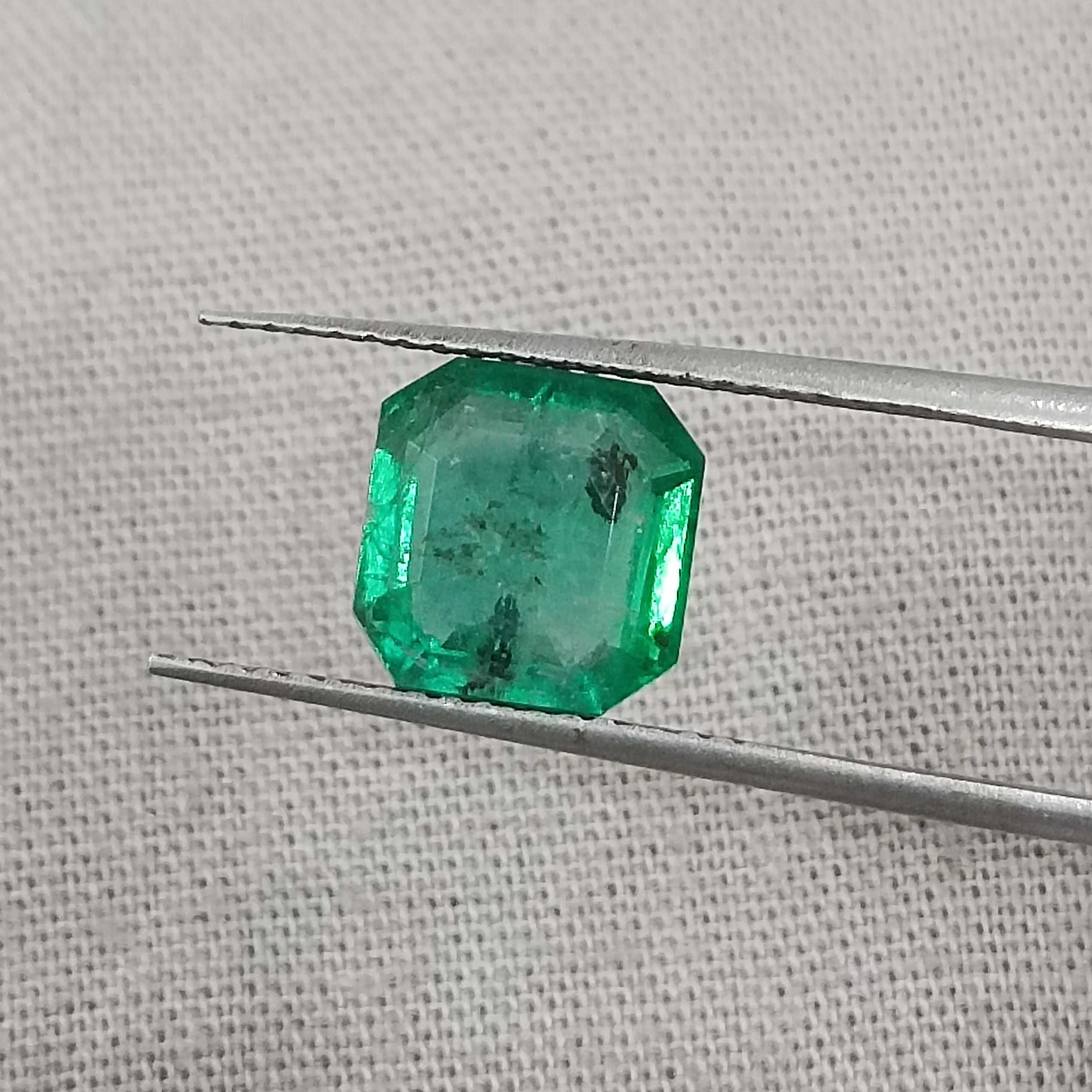2.43cts certified grass green color octagon cut emerald 