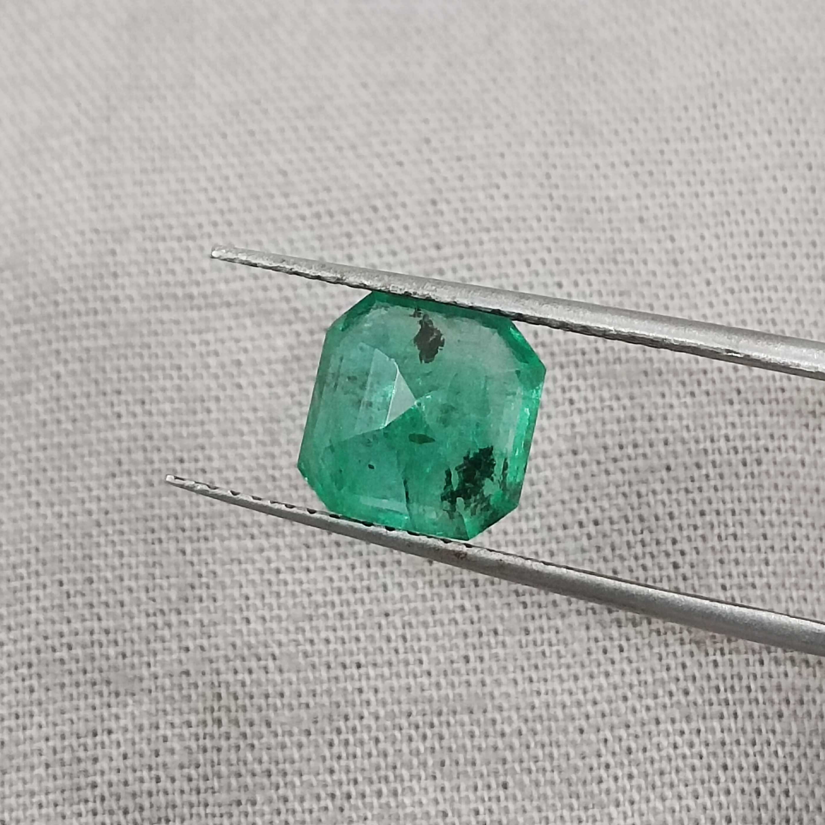2.43cts certified grass green color octagon cut emerald 