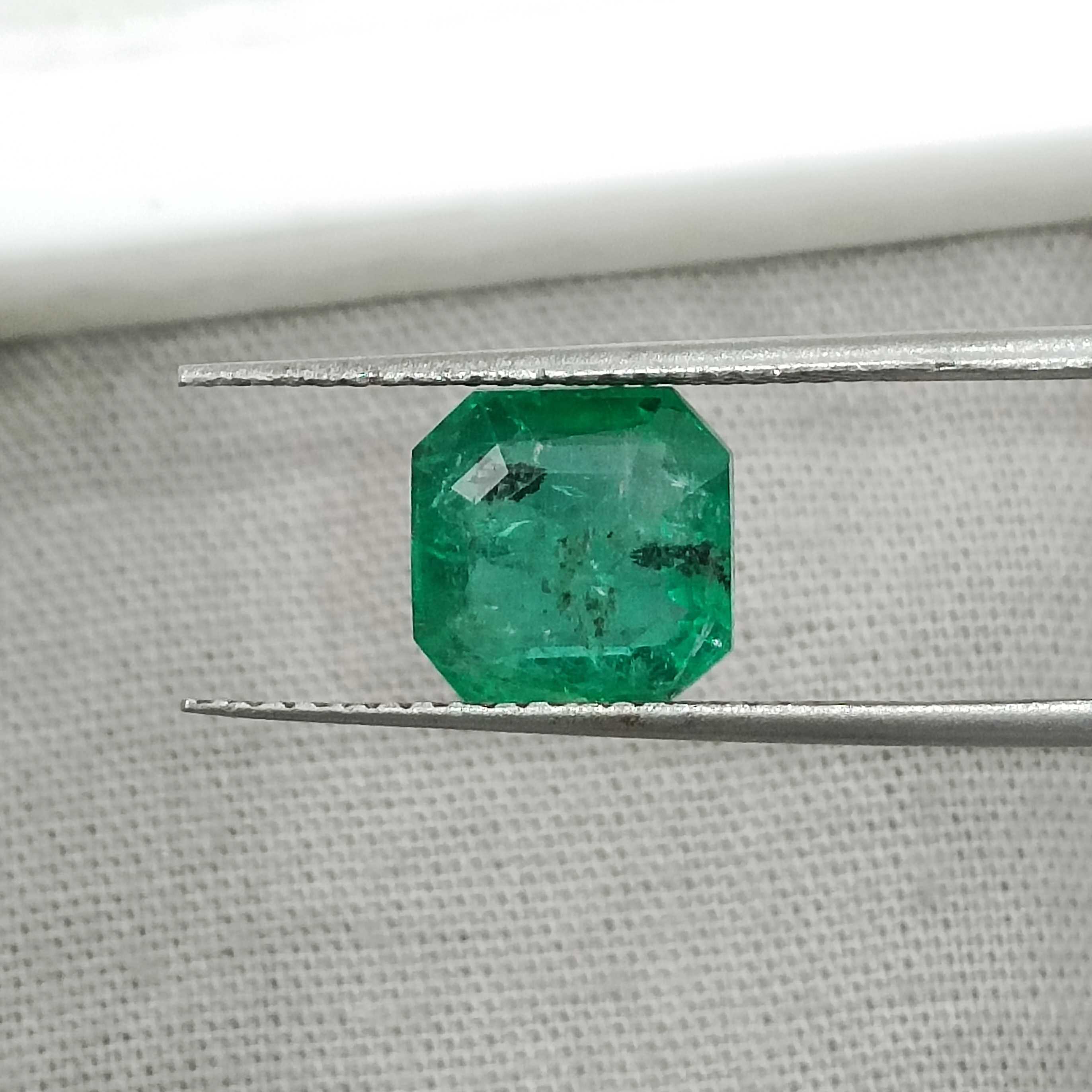 2.43cts certified grass green color octagon cut emerald 