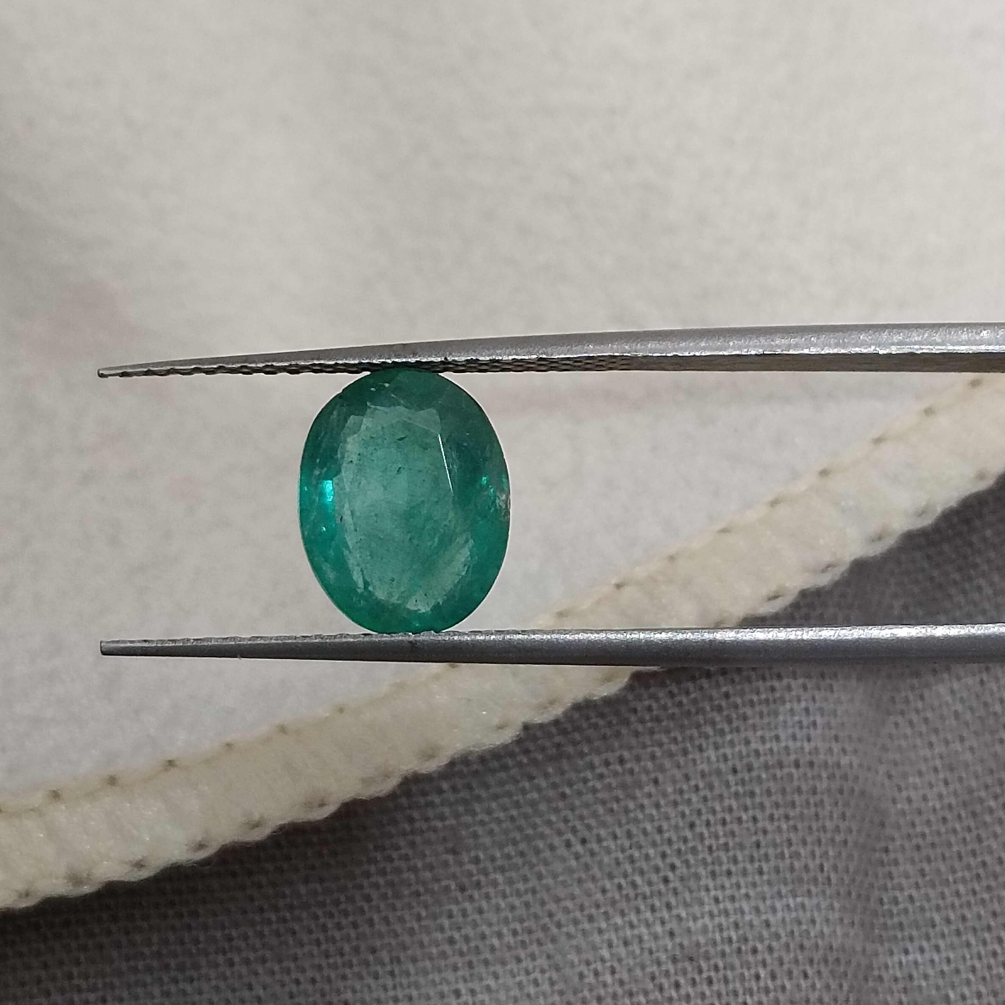 2.07cts certified forest green oval shaped Zambian emerald 