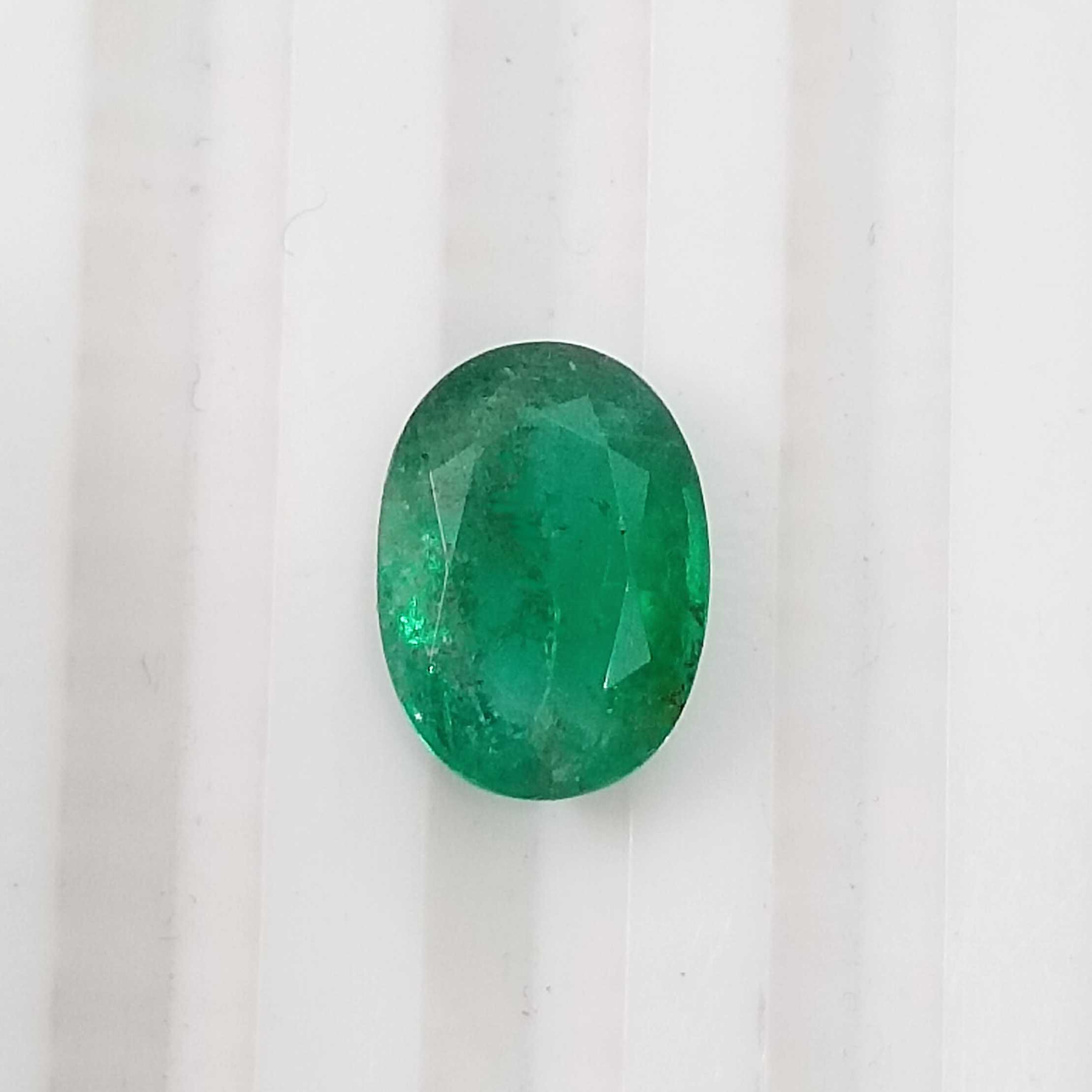 1.69cts GSI certified deep golden green oval cut Zambian emerald gemstone 