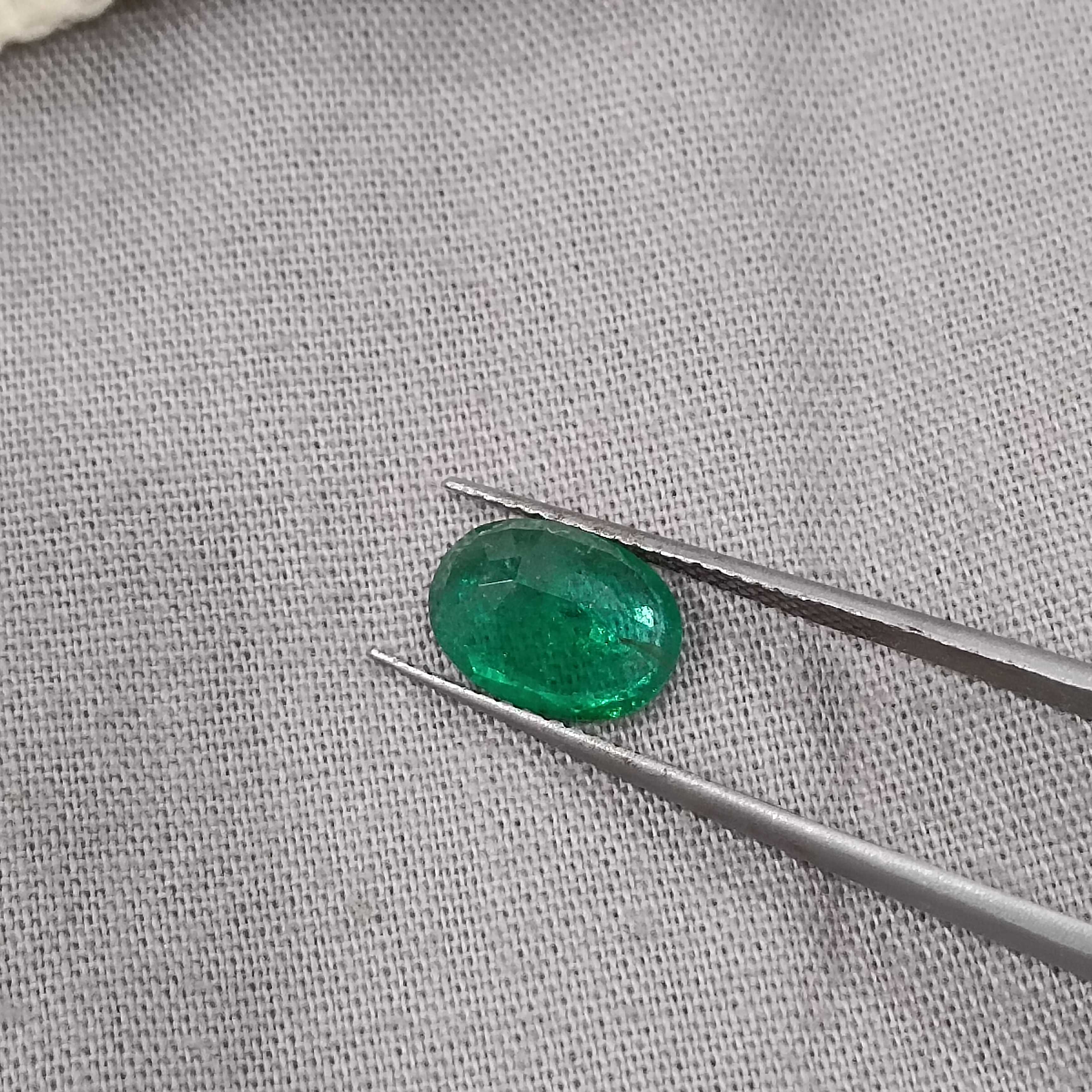 1.69cts GSI certified deep golden green oval cut Zambian emerald gemstone 