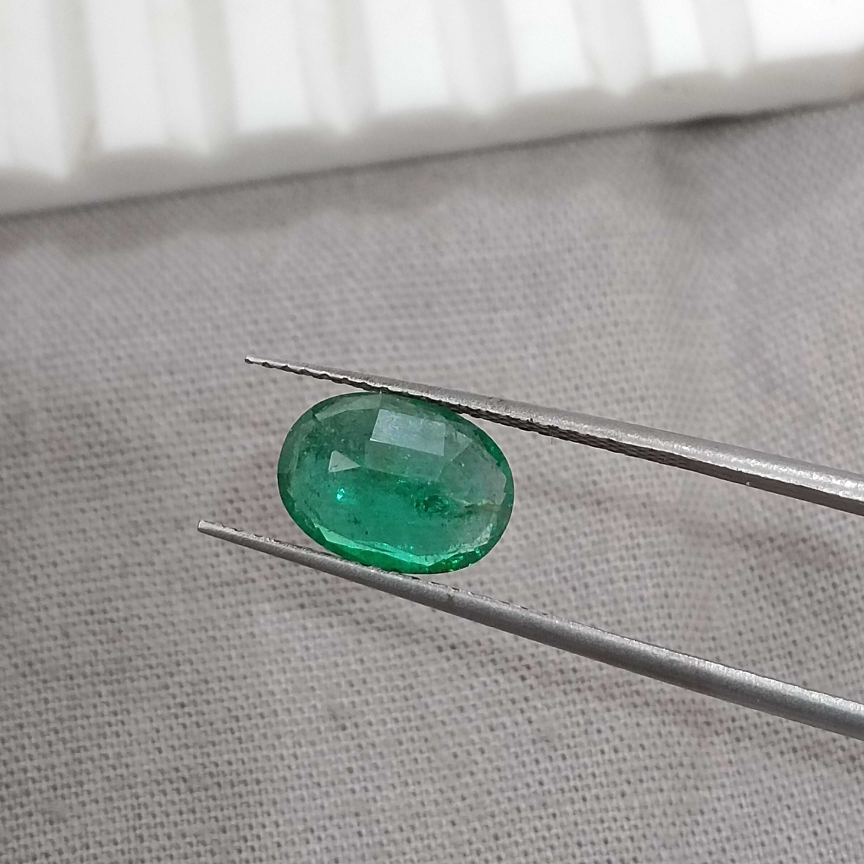 1.69cts GSI certified deep golden green oval cut Zambian emerald gemstone 