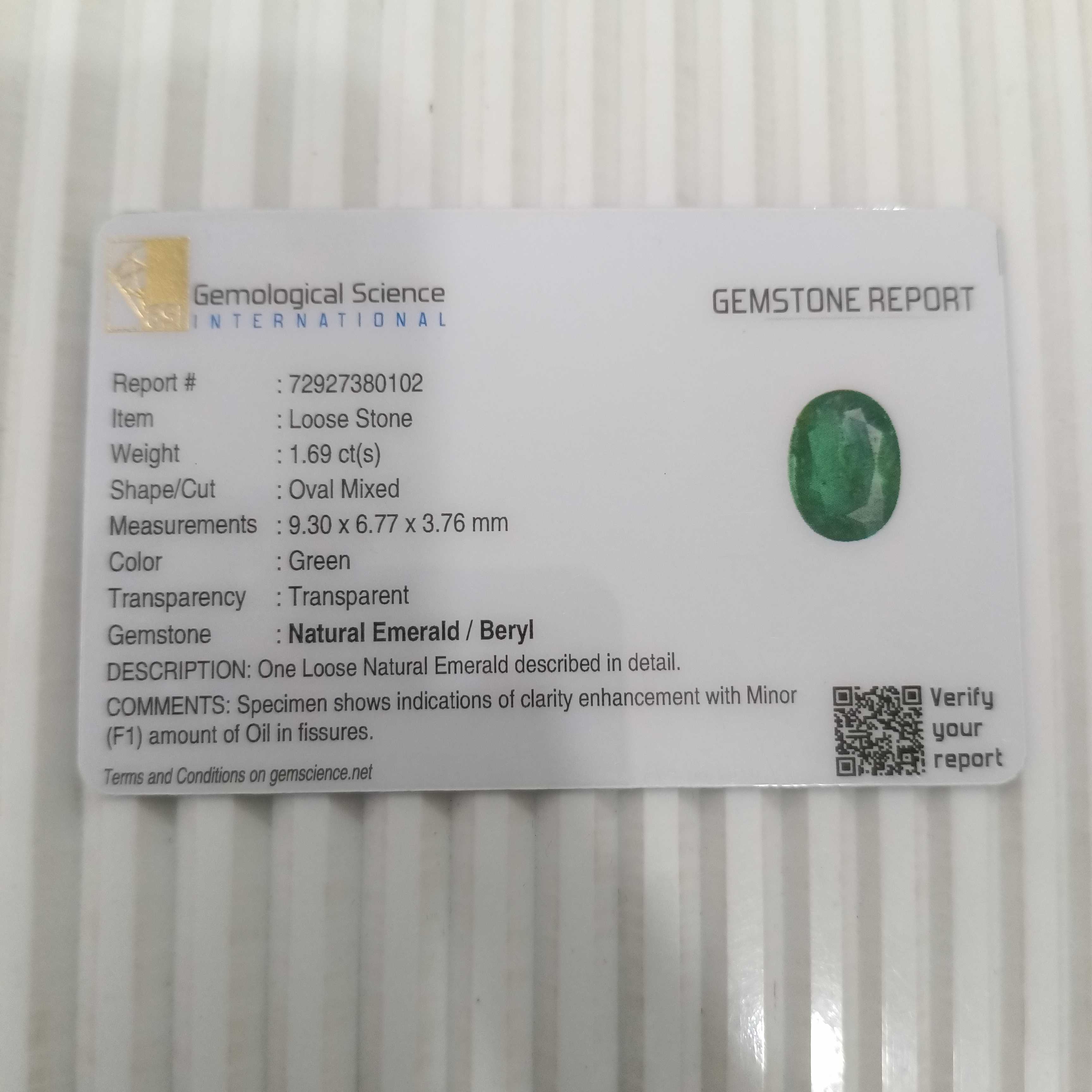 1.69cts GSI certified deep golden green oval cut Zambian emerald gemstone 