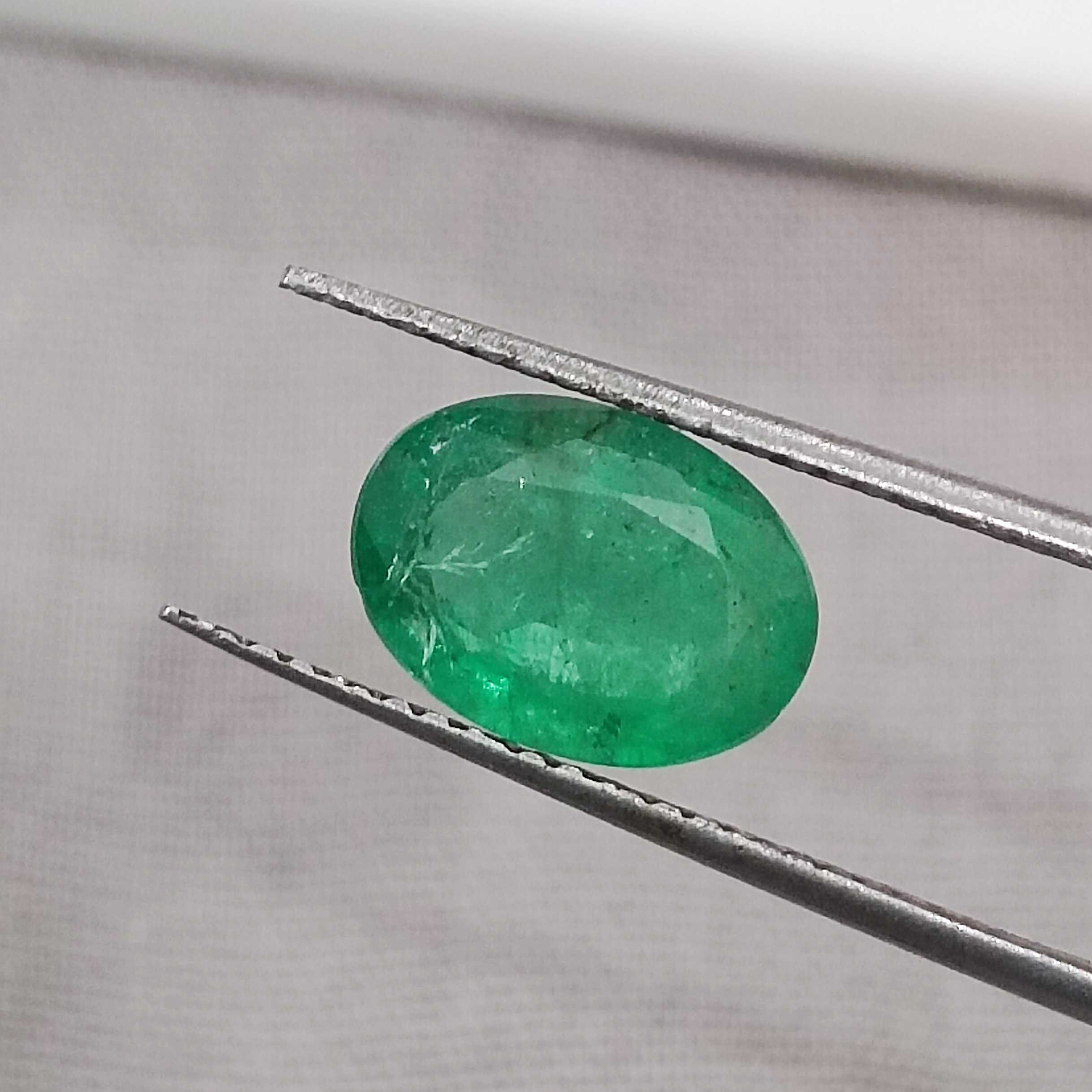 1.87cts certified medium pure green oval cut Zambian emerald 