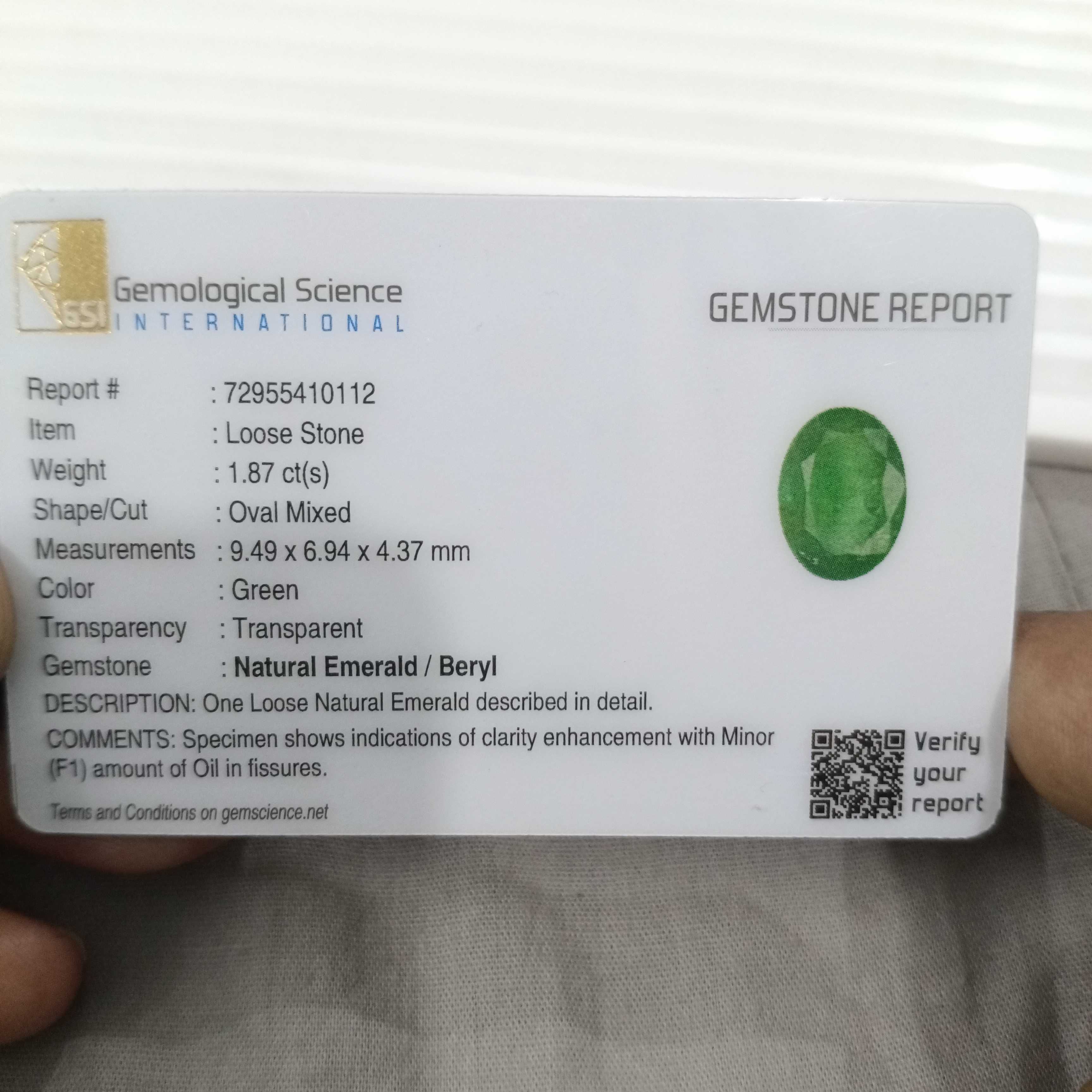1.87cts certified medium pure green oval cut Zambian emerald 