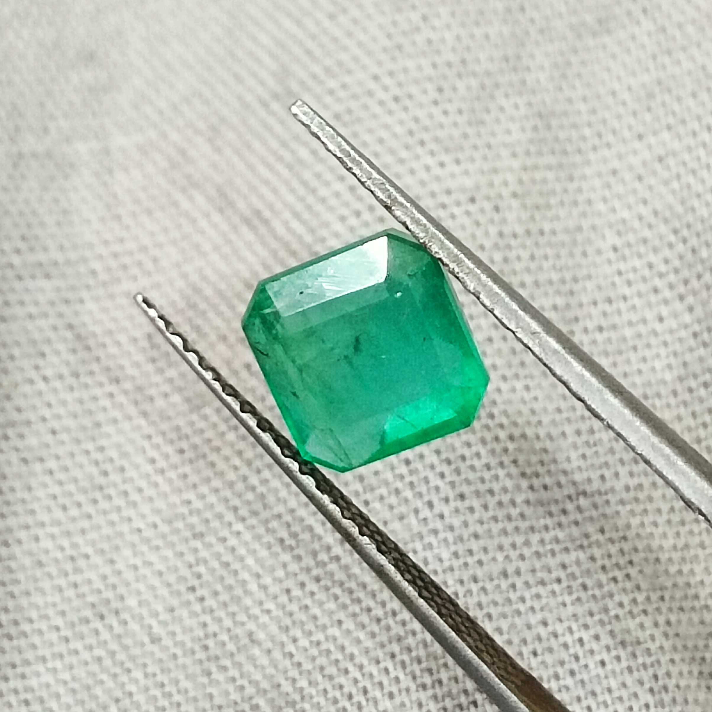 1.69cts certified cool icy green octagon shape Zambia emerald 
