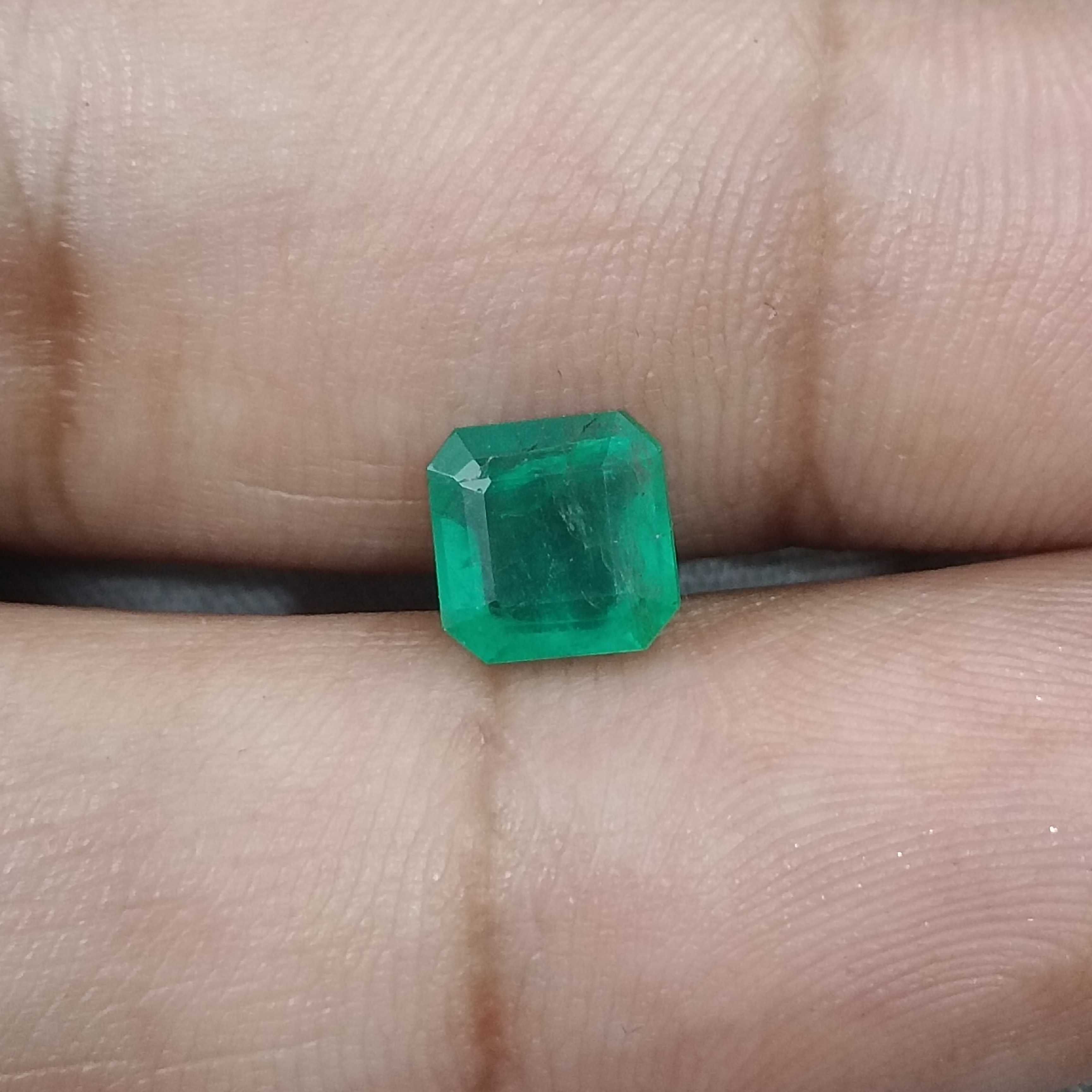 1.69cts certified cool icy green octagon shape Zambia emerald 