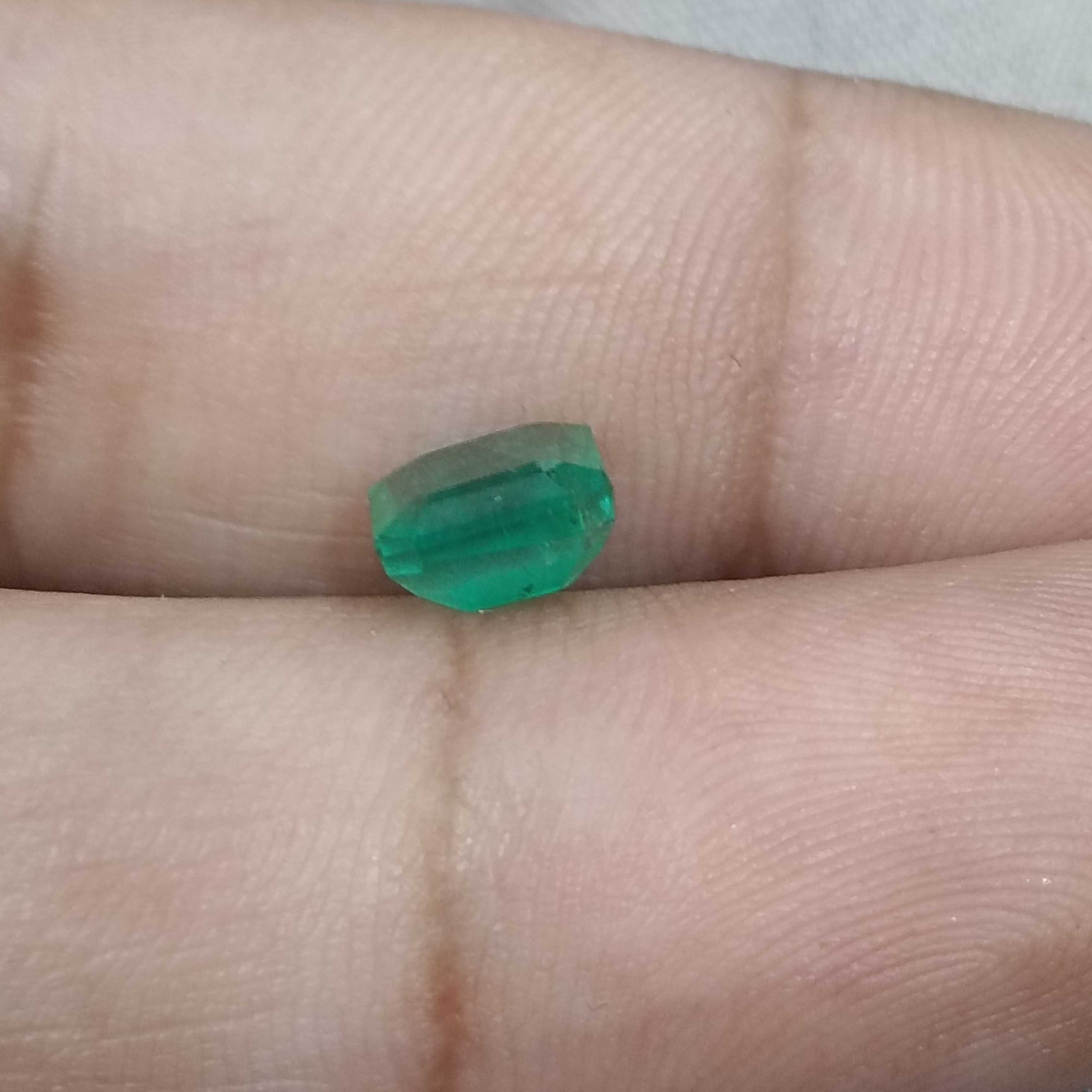 1.69cts certified cool icy green octagon shape Zambia emerald 