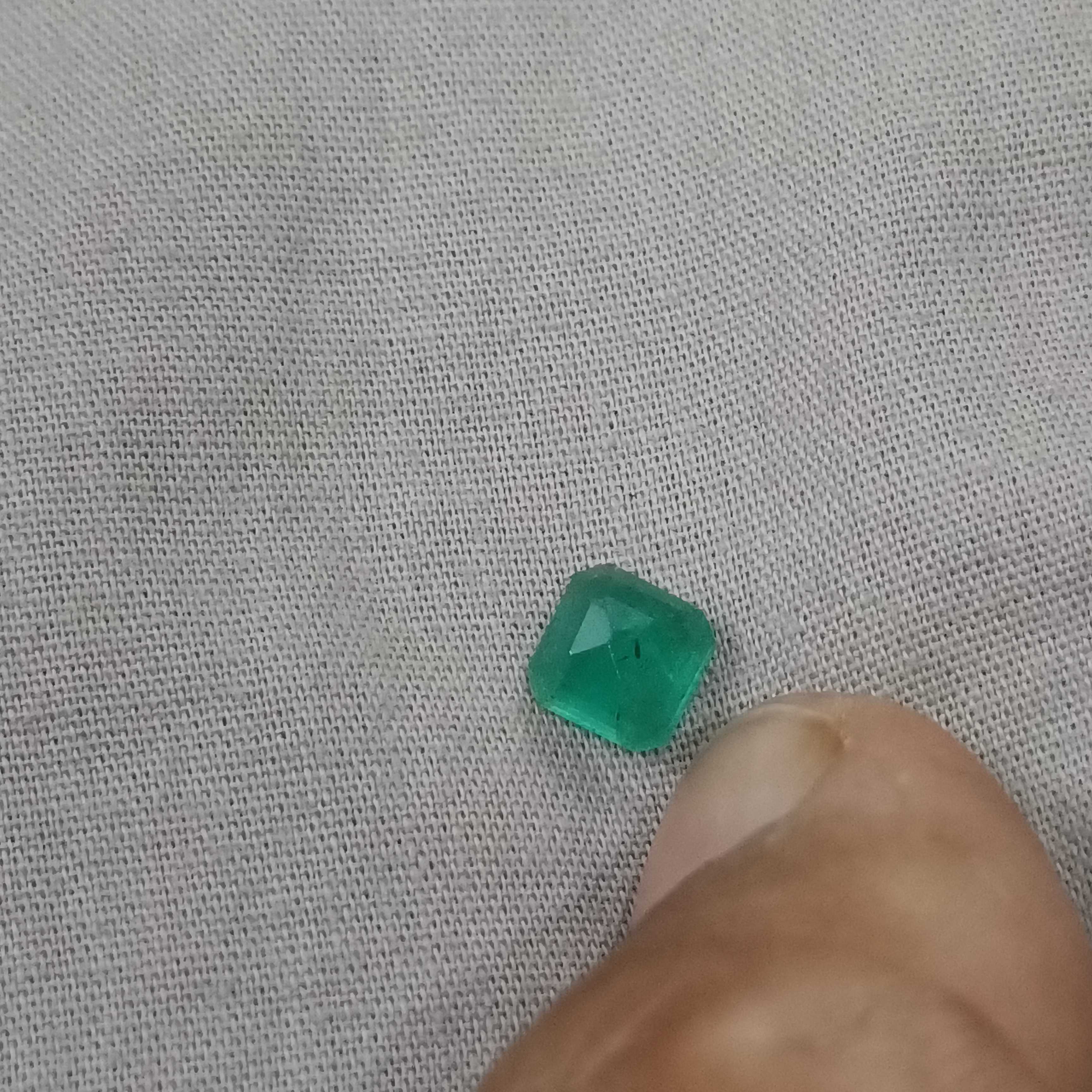 1.69cts certified cool icy green octagon shape Zambia emerald 